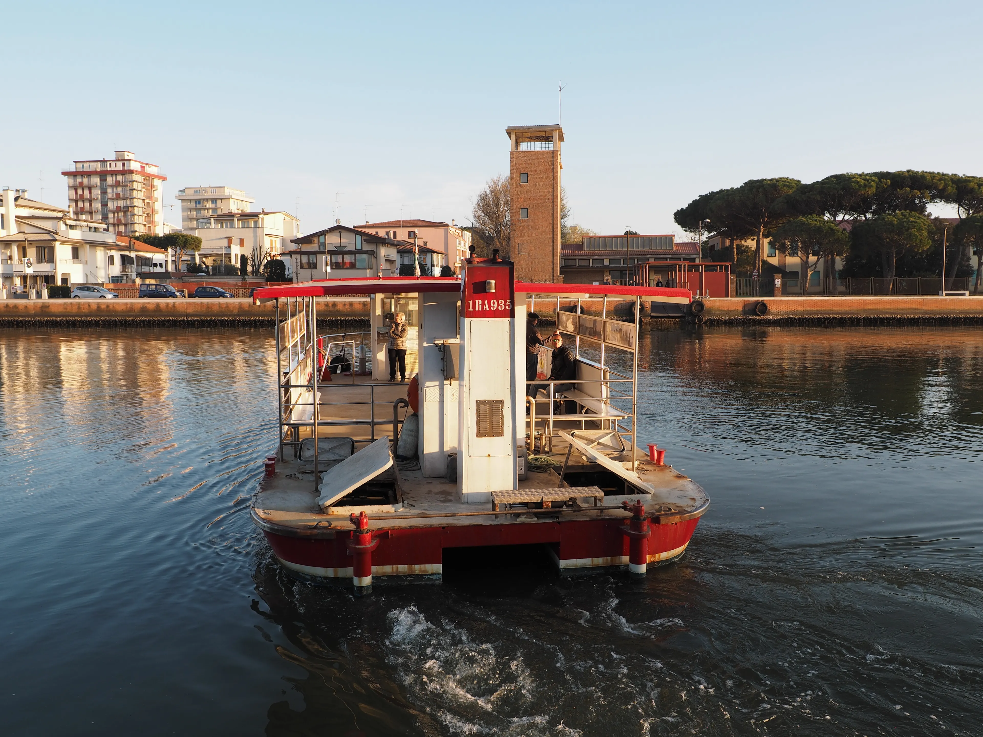 Porto Garibaldi, Italy - March 31, 2019. Ferry that goes back and forth between the shores of Porto Garibaldi and Lido degli Estensi.
