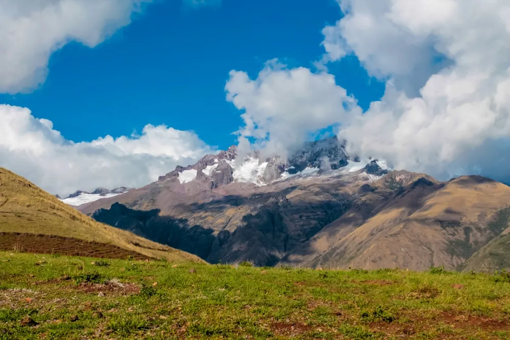 Urubamba village in Peru, Lares trek. Vegetation of the mountains in Peru. Peruvian dry soil and suculent plants growing on high altitude. Mountains of Peru landscape