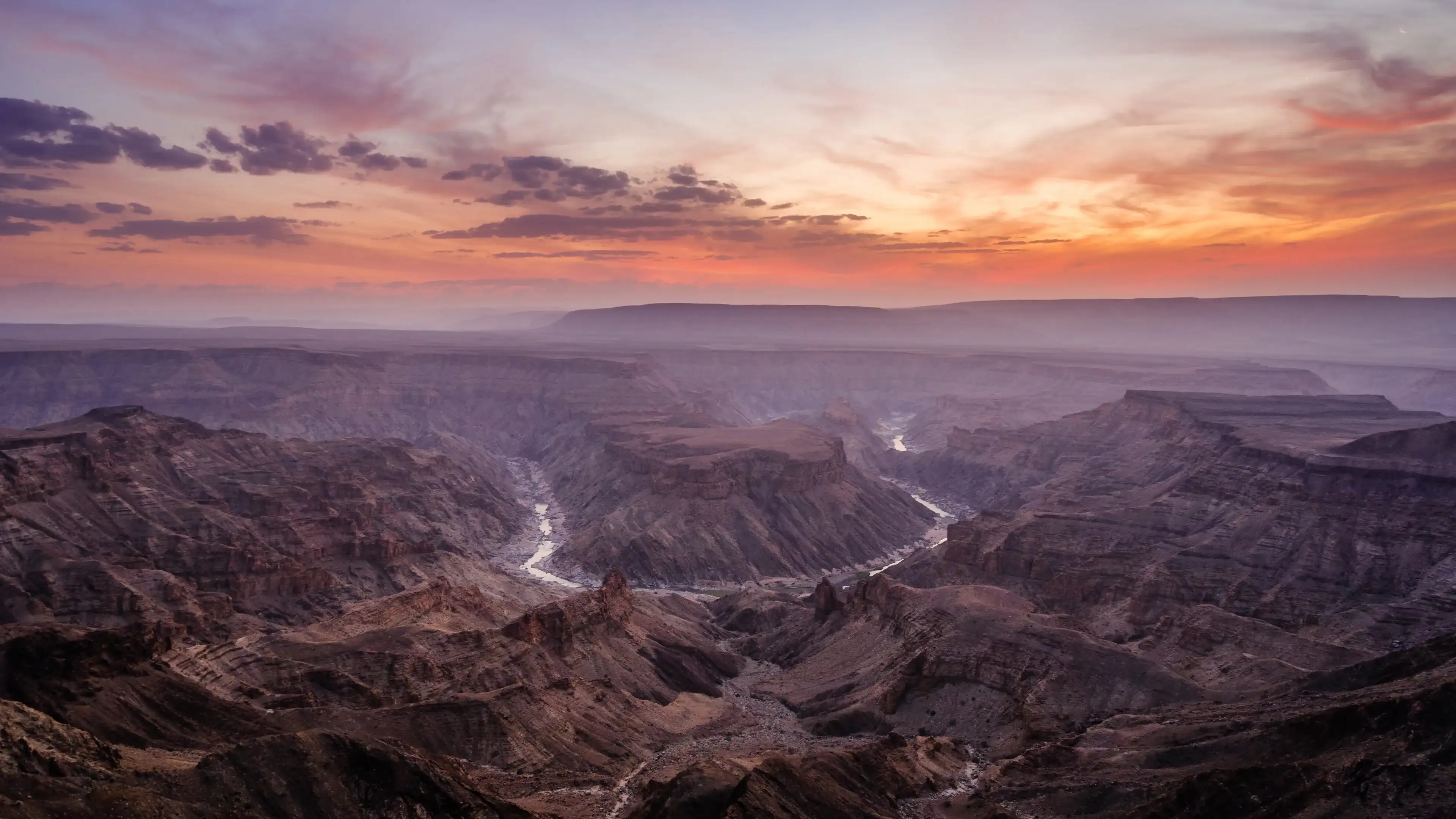Sunset over the Fish River Canyon in Namibia, the second largest canyon in the world and the largest in Africa. Sunset over the Fish River Canyon in Namibia, the second largest canyon in the world and the largest in Africa.