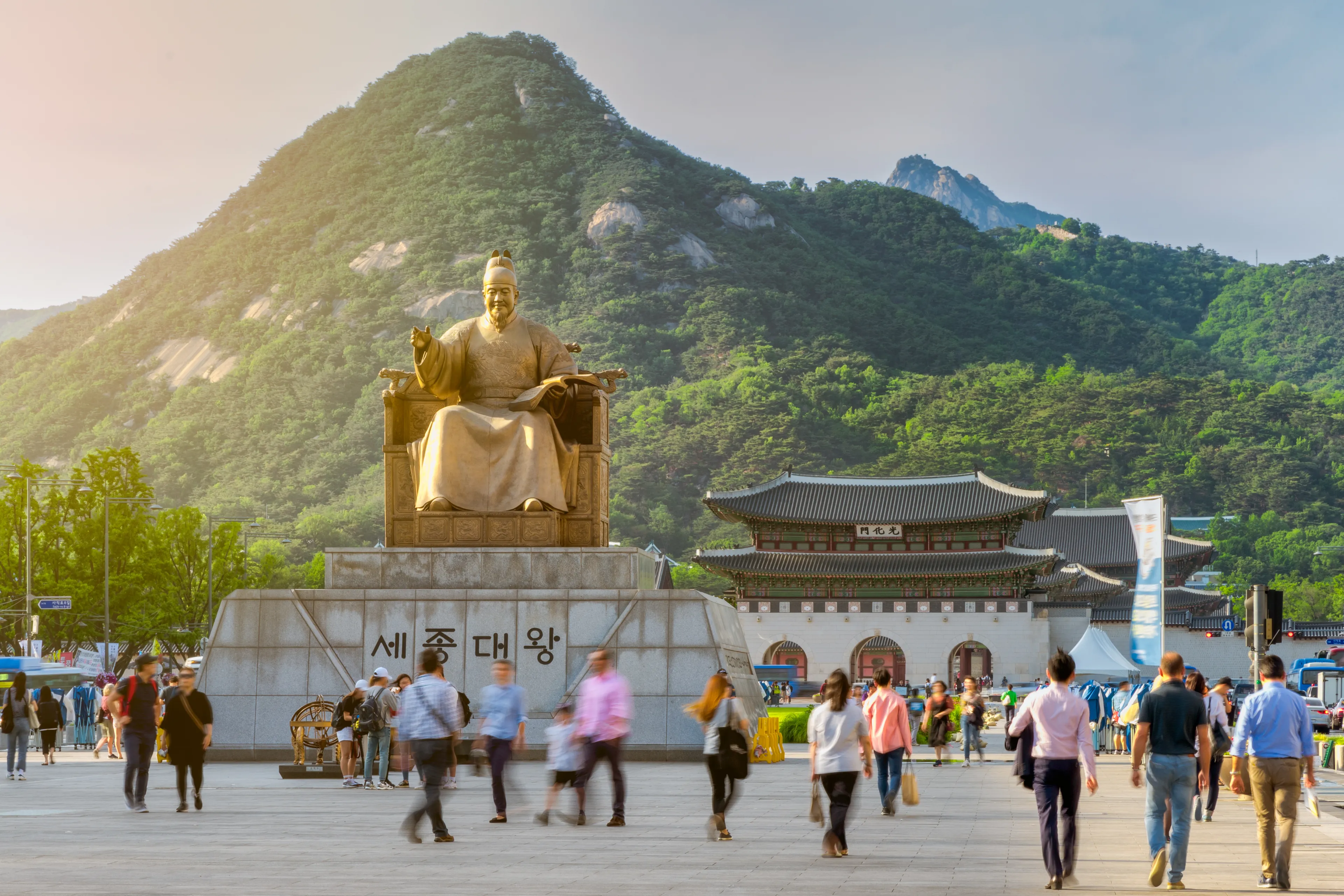 King Sejong Statue in Gwanghwamun Plaza with Gwanghwamun Gate in background 