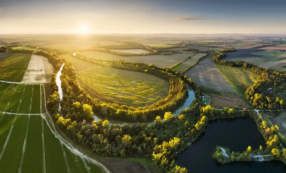 Sunset at Danube river meandering through romantic Slovakia countryside nature landscape Near Senec from drone. Sunset at Danube river meandering through romantic Slovakia countryside nature landscape Near Senec from drone.