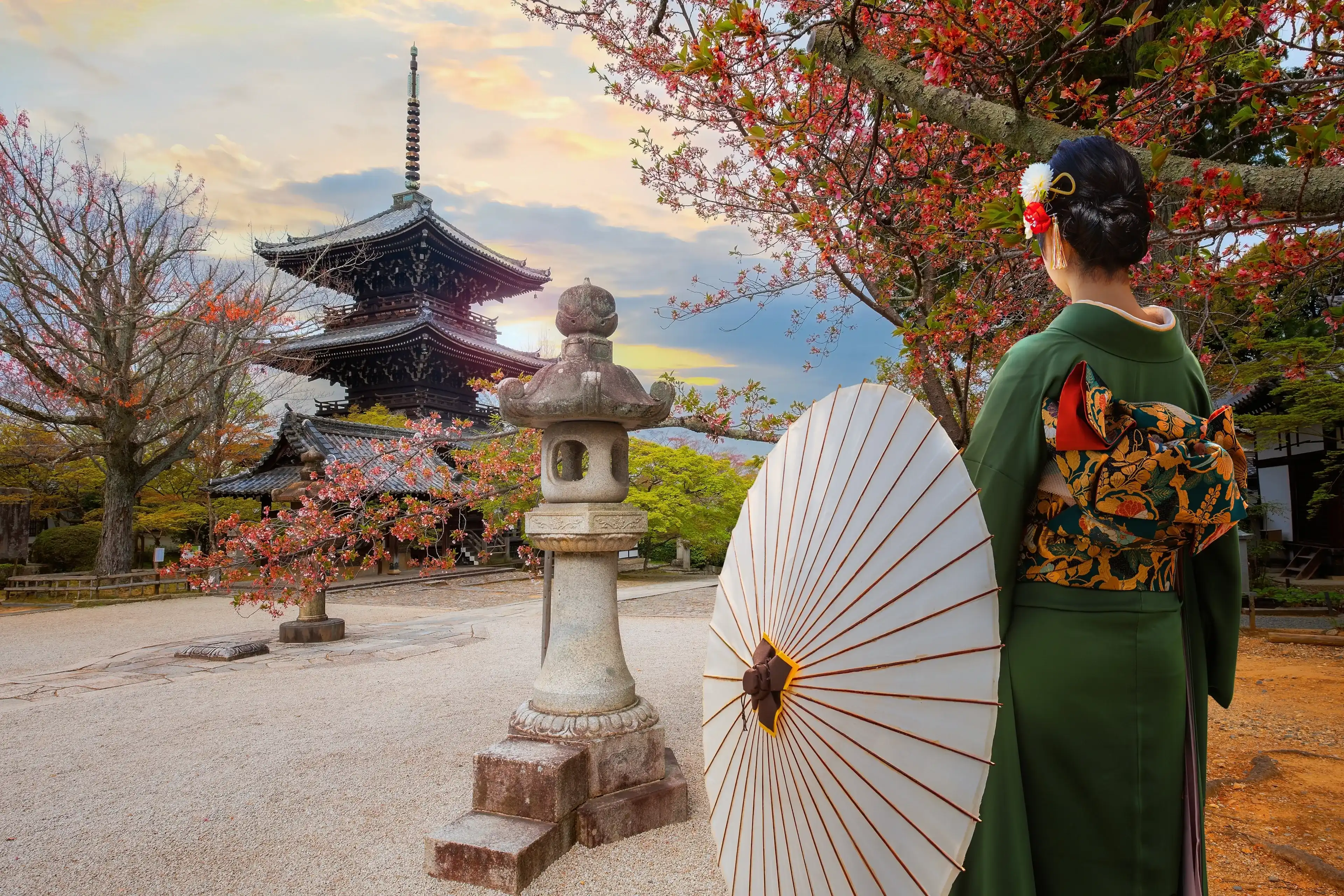 Young Japanese woman in a traditional Kimono dress at Shinnyodo temple in Kyoto, Japan Young Japanese woman in a traditional Kimono dress at Shinnyodo temple in Kyoto, Japan