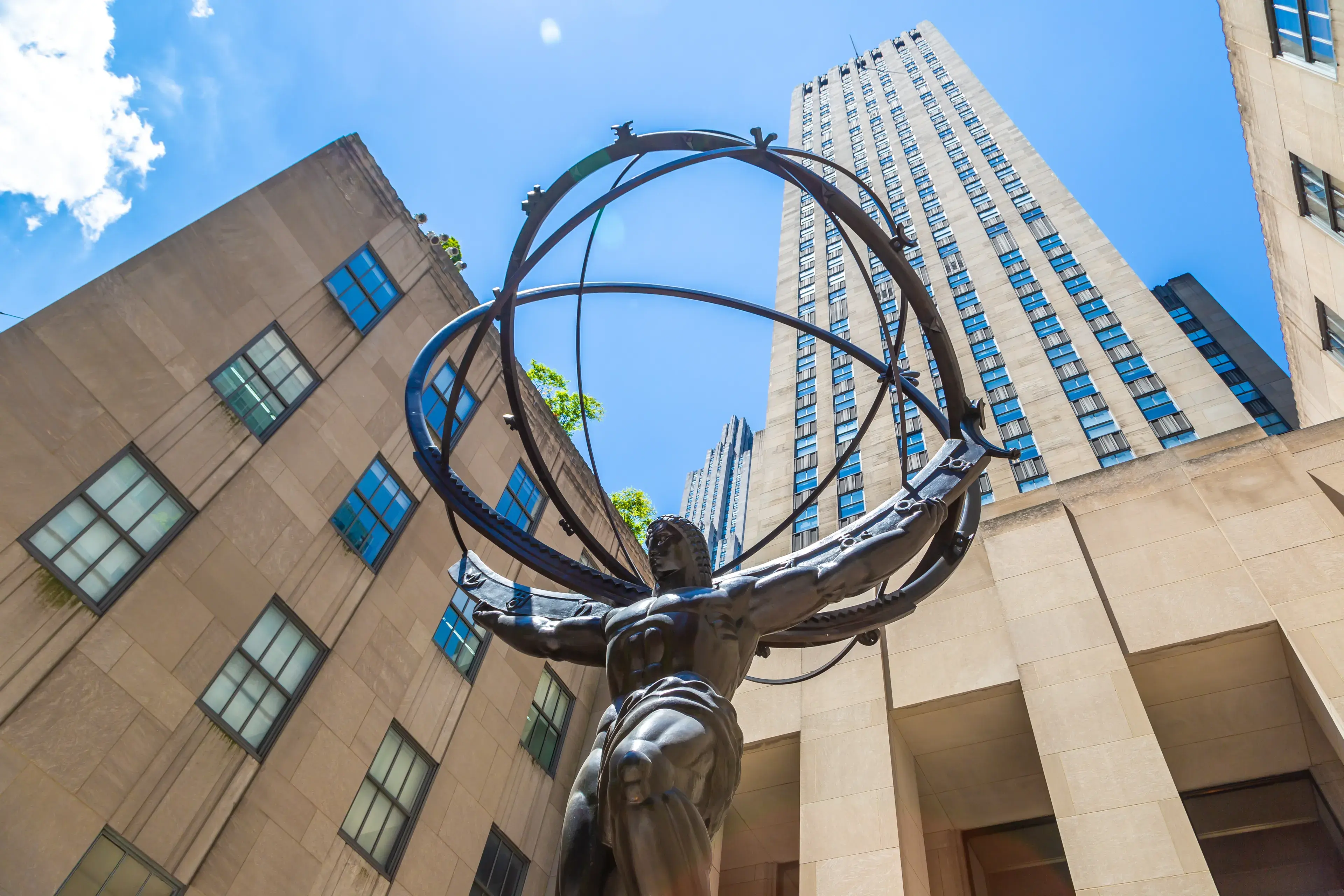NEW YORK CITY, USA - MARCH 15, 2020: Atlas Statue at Rockefeller Center in Manhattan, New York City, USA NEW YORK CITY, USA - MARCH 15, 2020: Atlas Statue at Rockefeller Center in Manhattan, New York City, USA