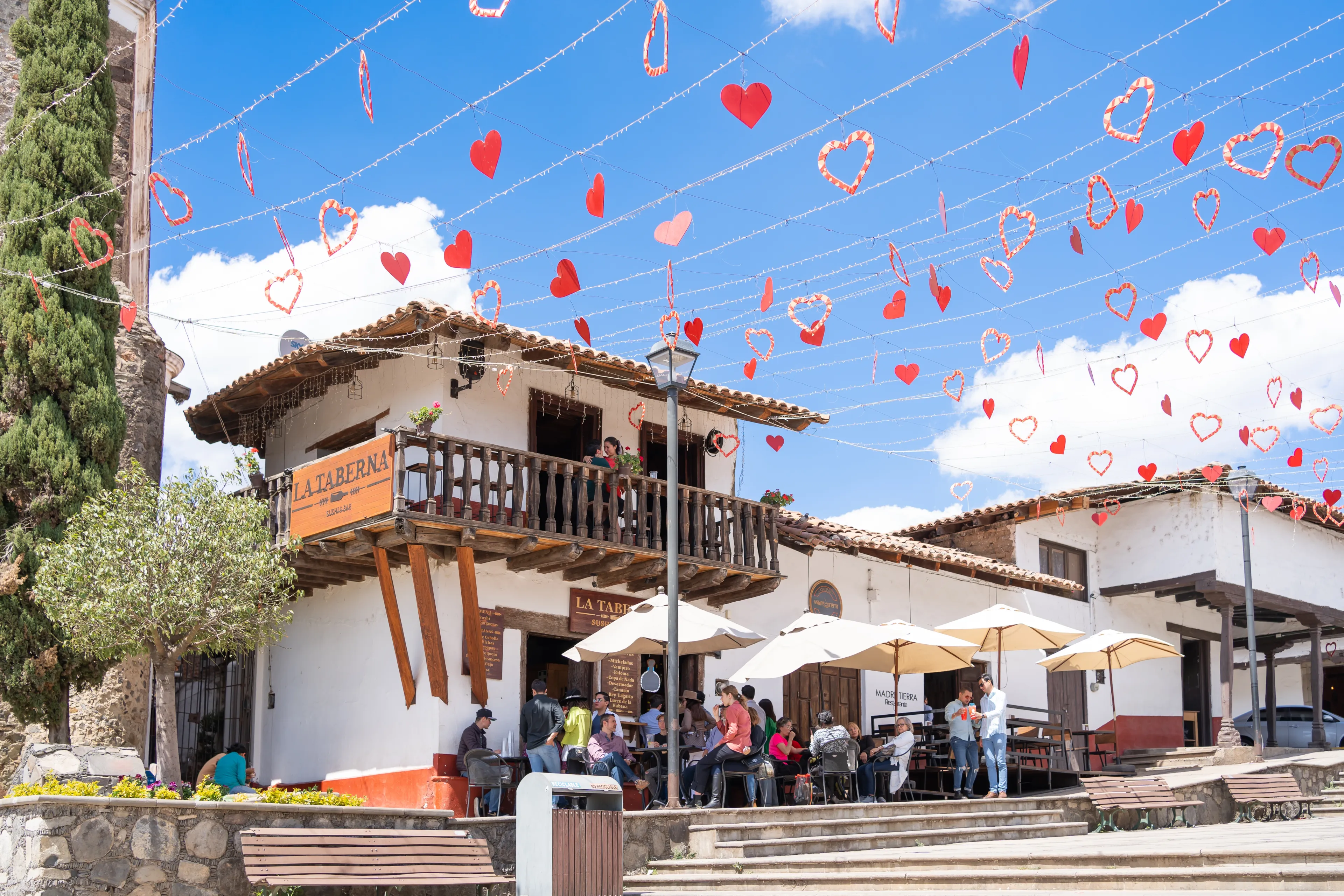 Tapalpa Jalisco, Mexico - March 5, 2022: People are enjoying a moment at a coffee shop in the center of the magical town of Tapalpa. 