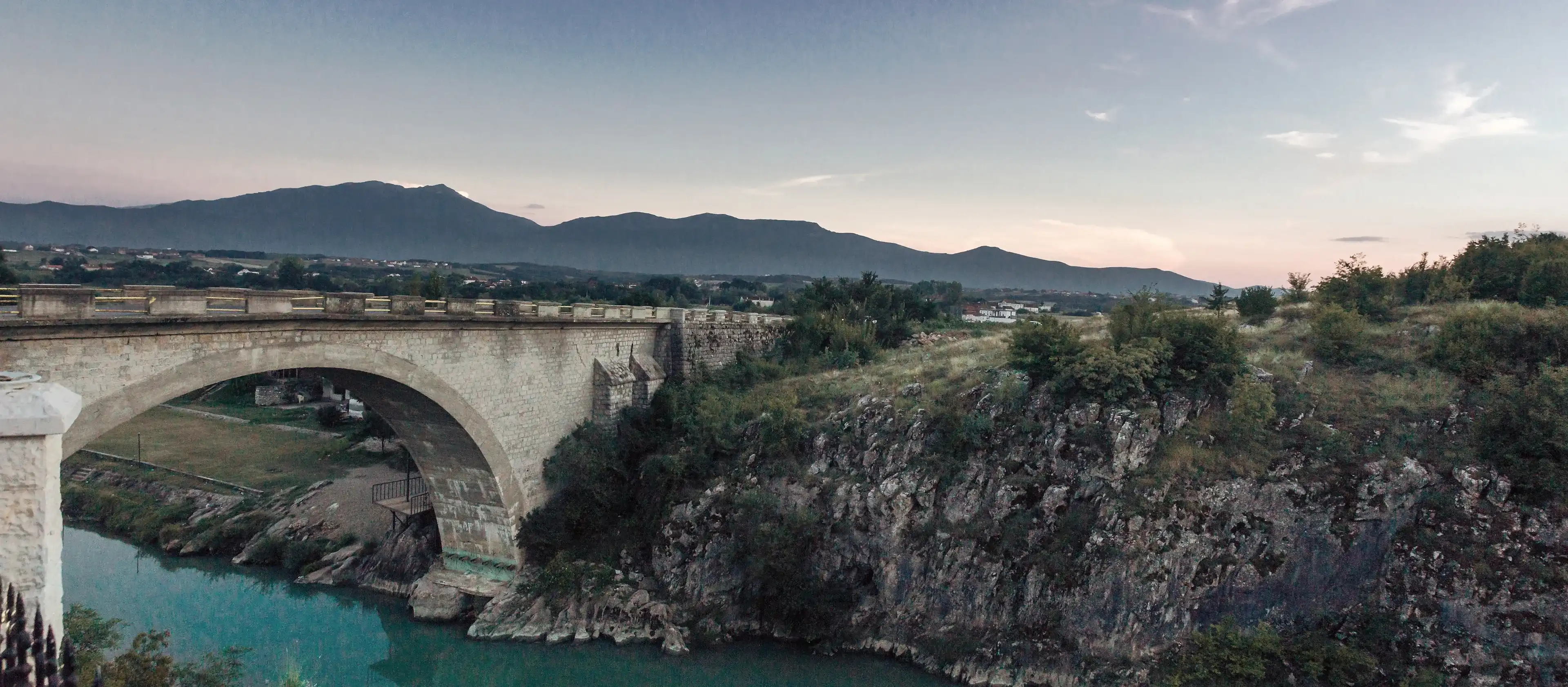 Panoramic view of the ancient holy bridge in Gjakovs, Kosovo in the evening atmoshpere Panoramic view of the ancient holy bridge in Gjakovs, Kosovo in the evening atmoshpere