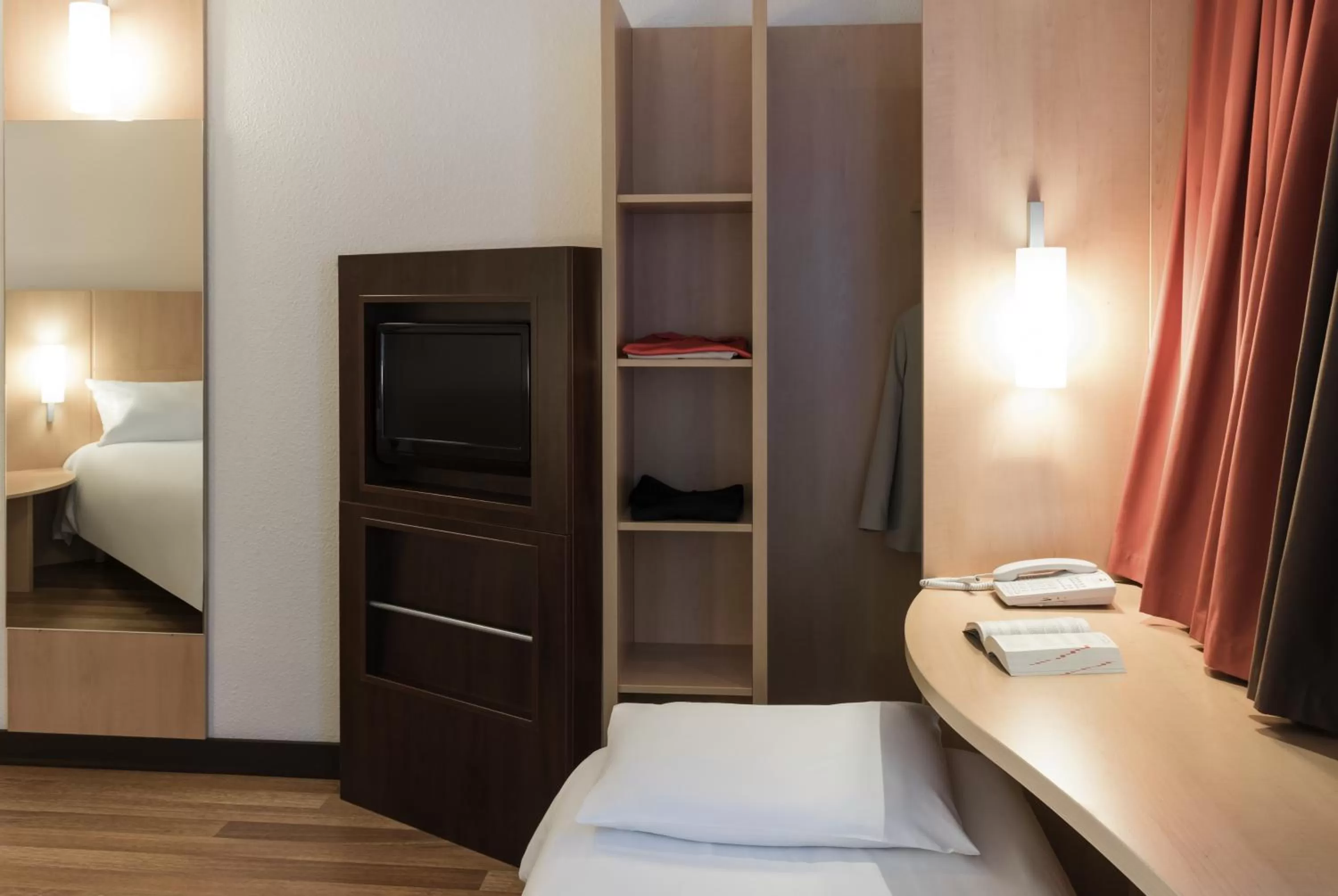 Decorative detail, Bed in ibis Angers Centre Chateau