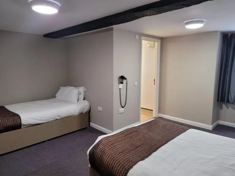 Bed in The Oakwood Hotel