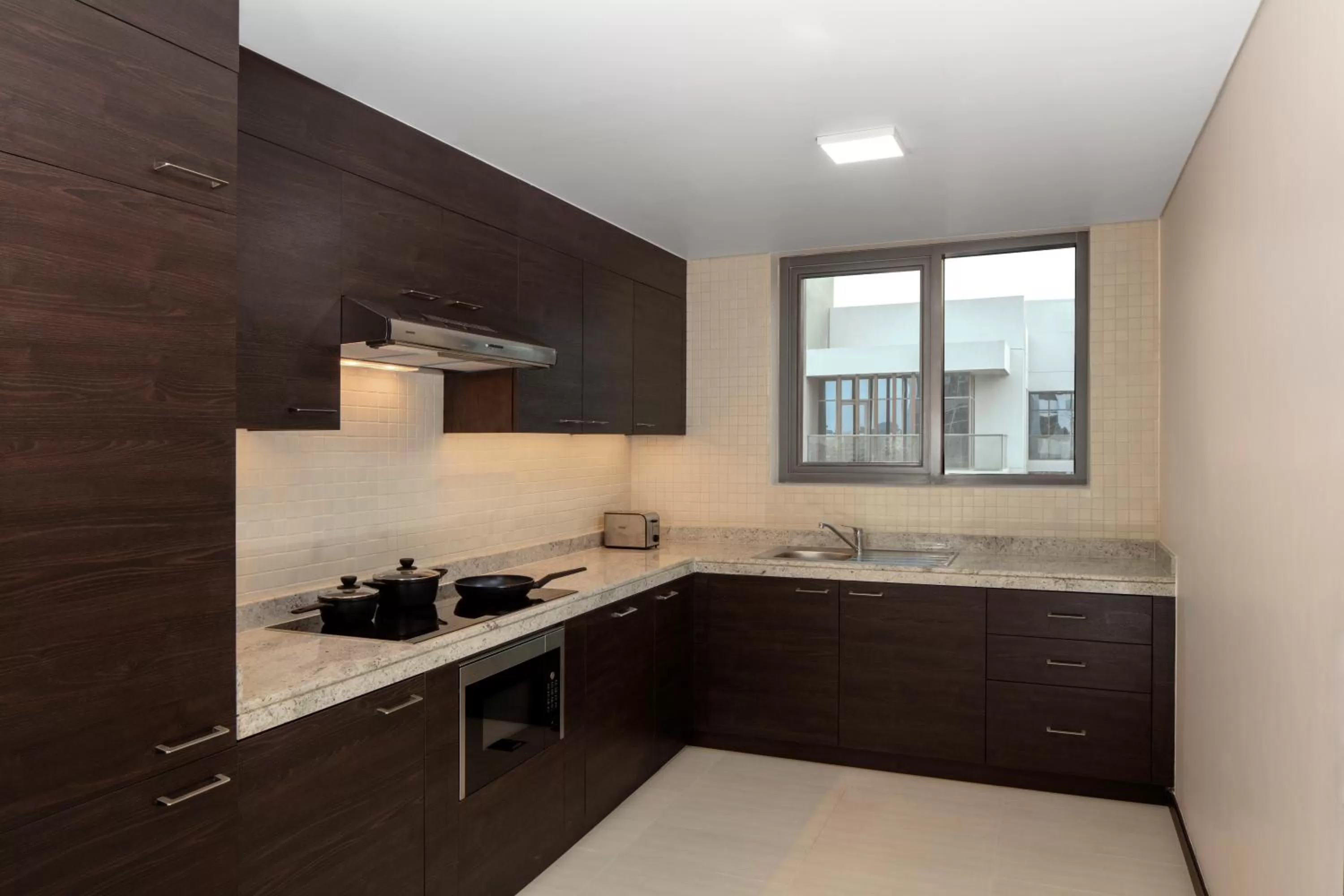 Kitchen or kitchenette in Hyatt Place Dubai Jumeirah Residences