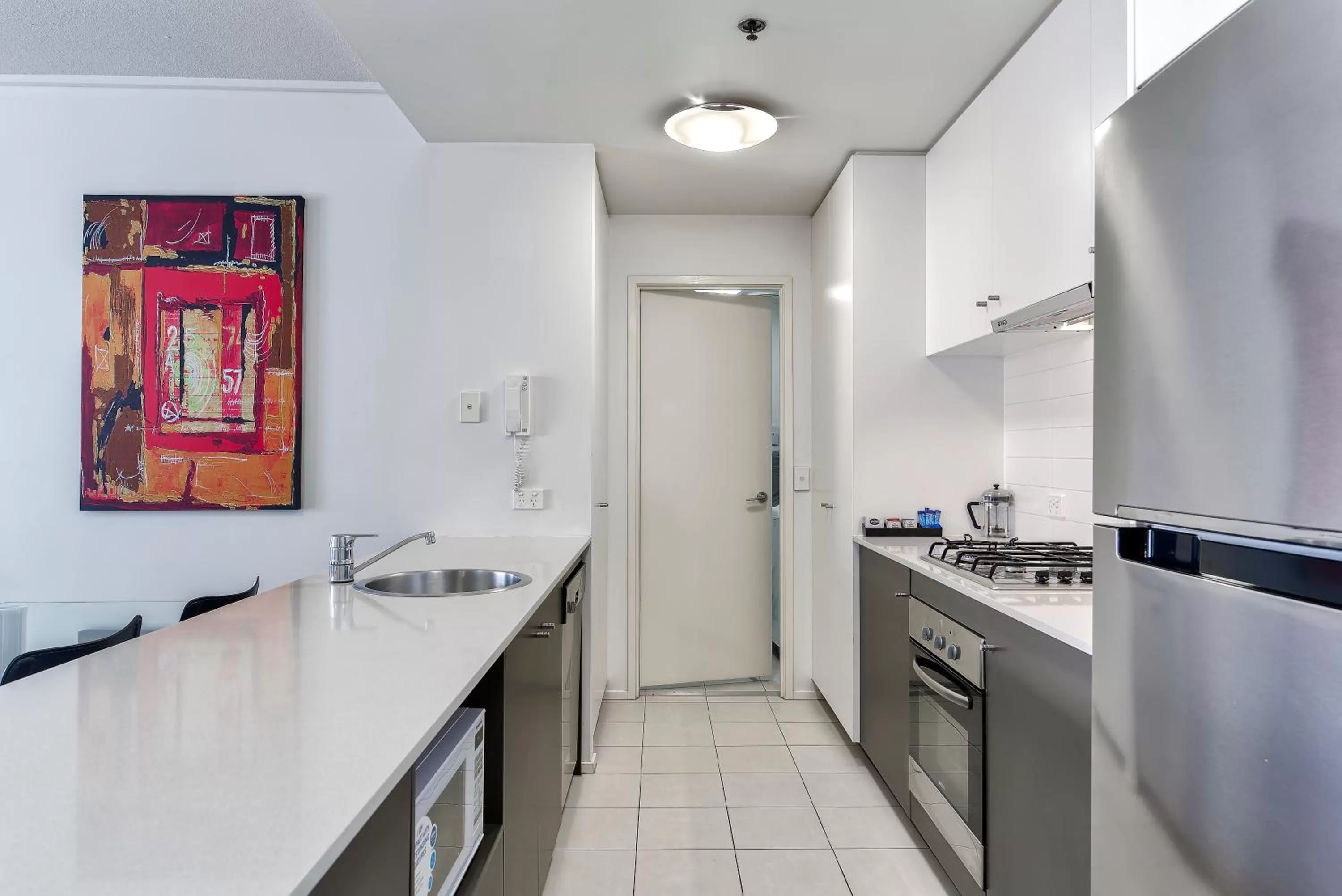 Kitchen or kitchenette in SKD Suites