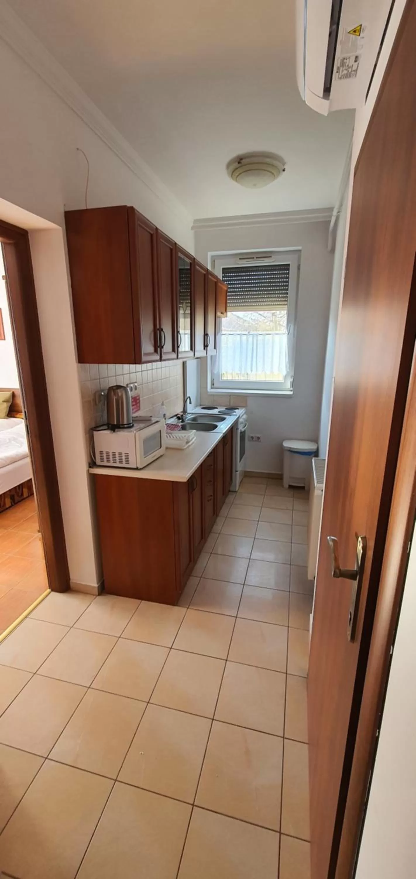 Kitchen/Kitchenette in Aqua Oazis Apartman