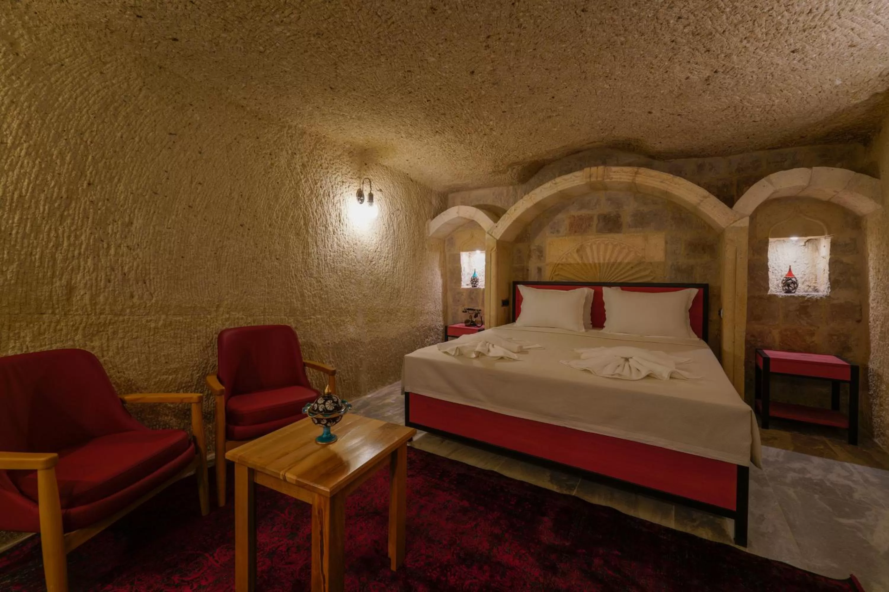 Bed in The Niche Cave Hotel