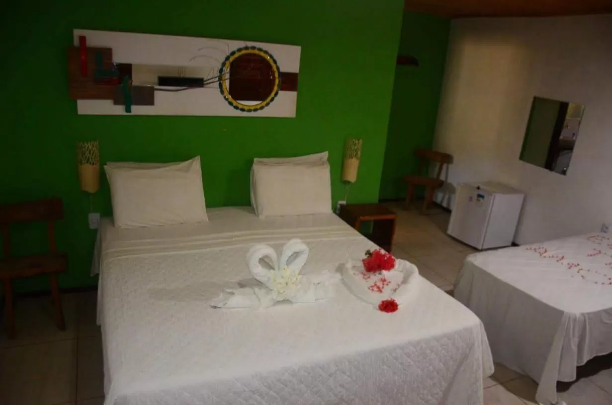 Bed in Pousada e Restaurante Encanto das Águas