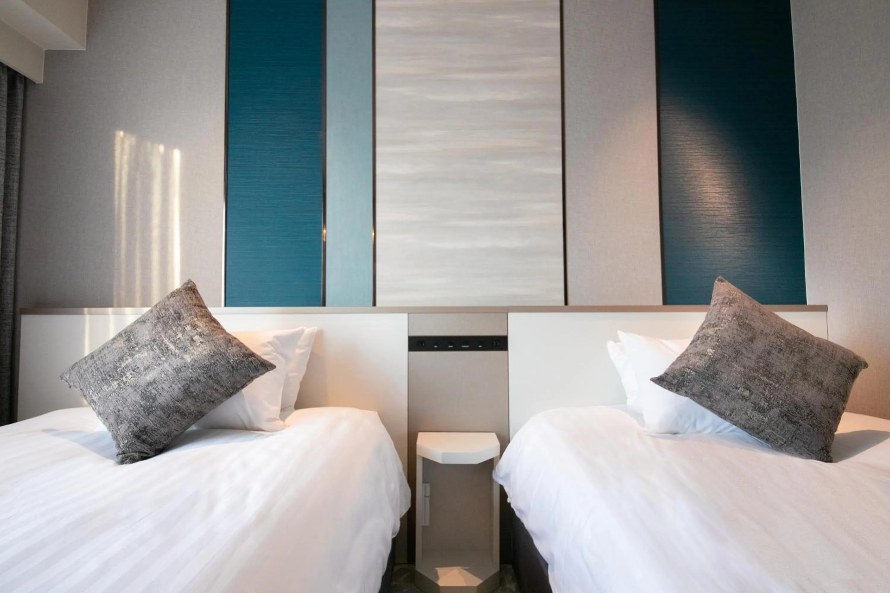 Photo of the whole room, Bed in Hotel JAL City Nagasaki