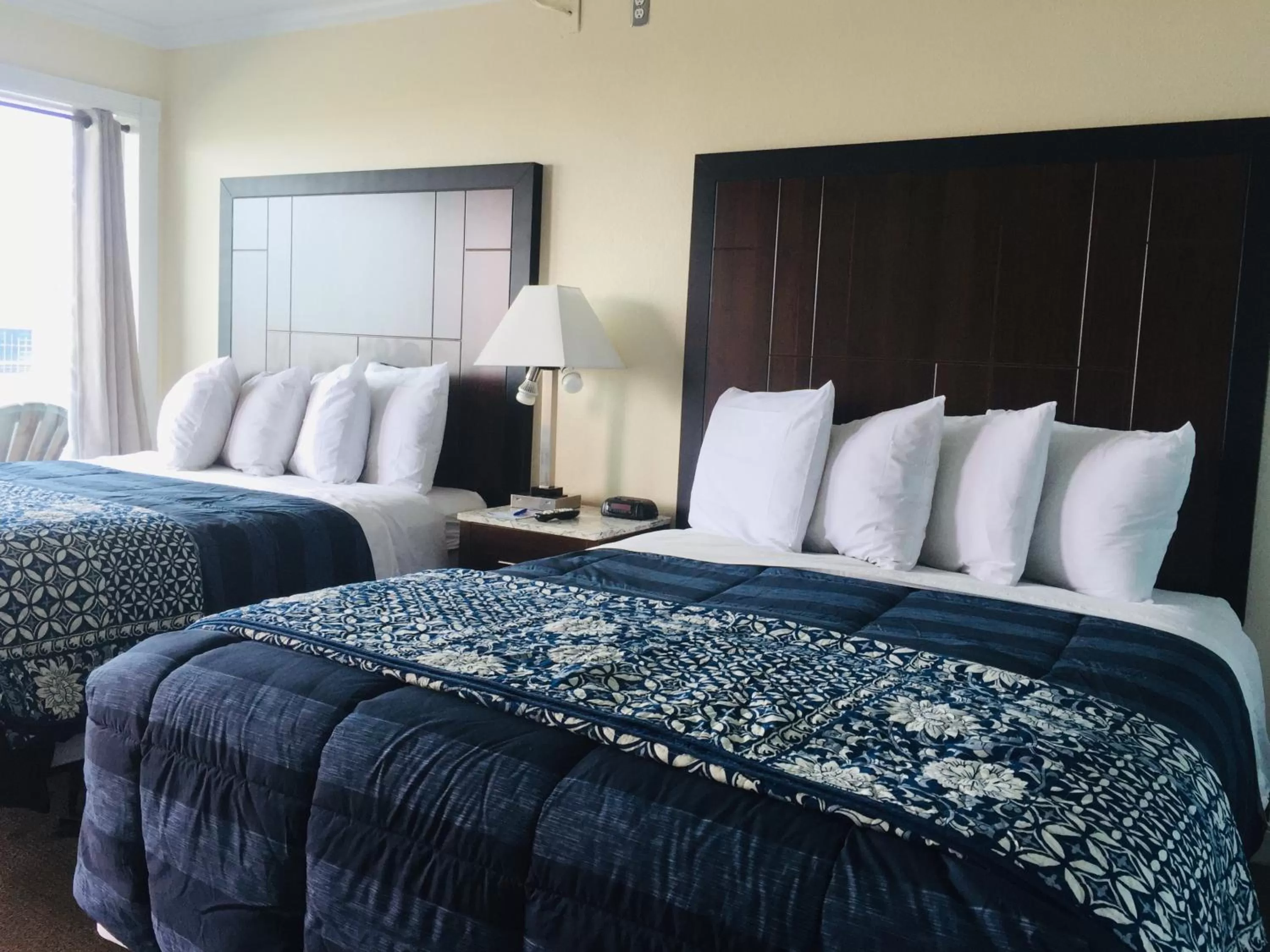 Bed in Dolphin Cove Motel