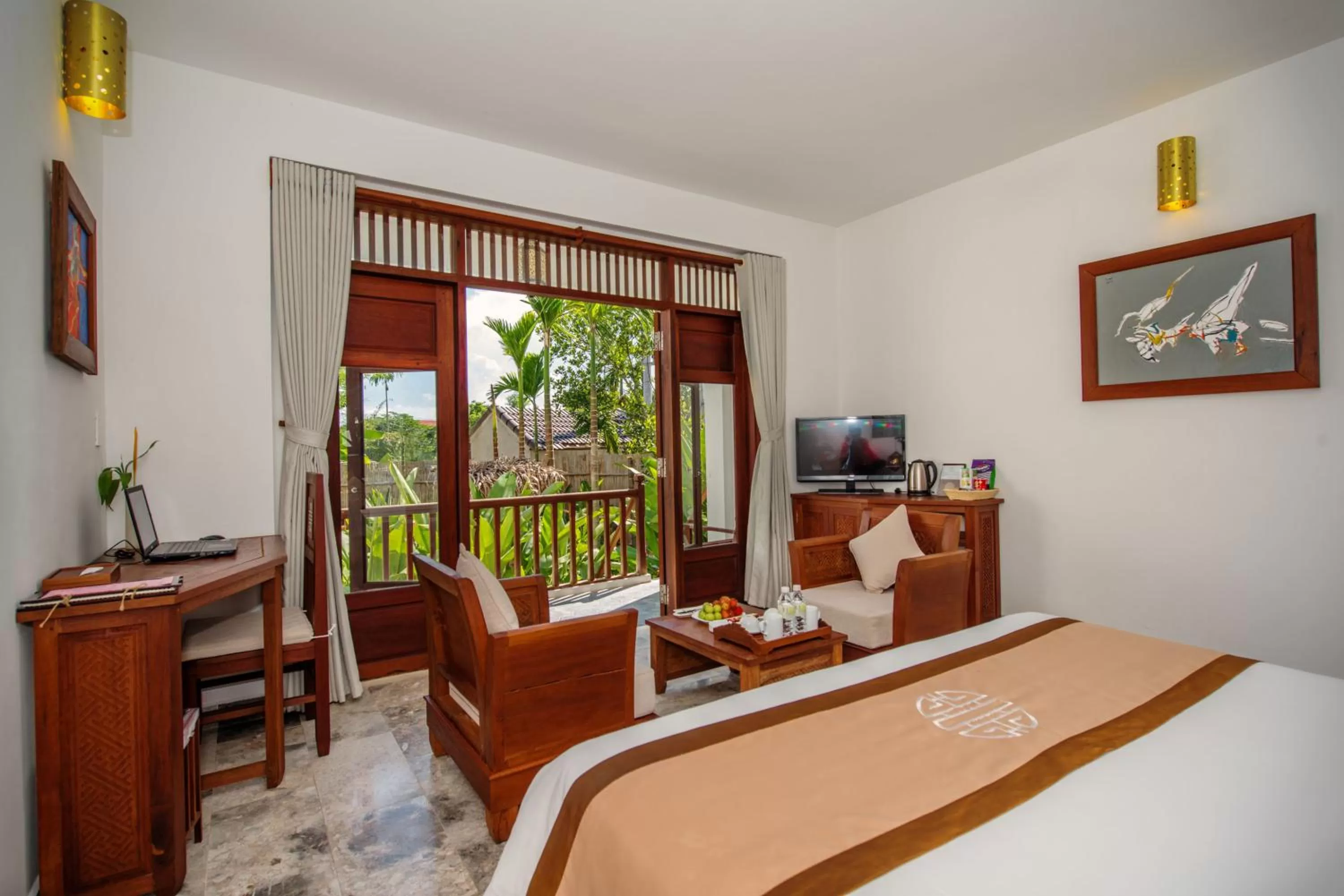 Bedroom in Legacy Hoi An Resort - formerly Ancient House Village Resort & Spa