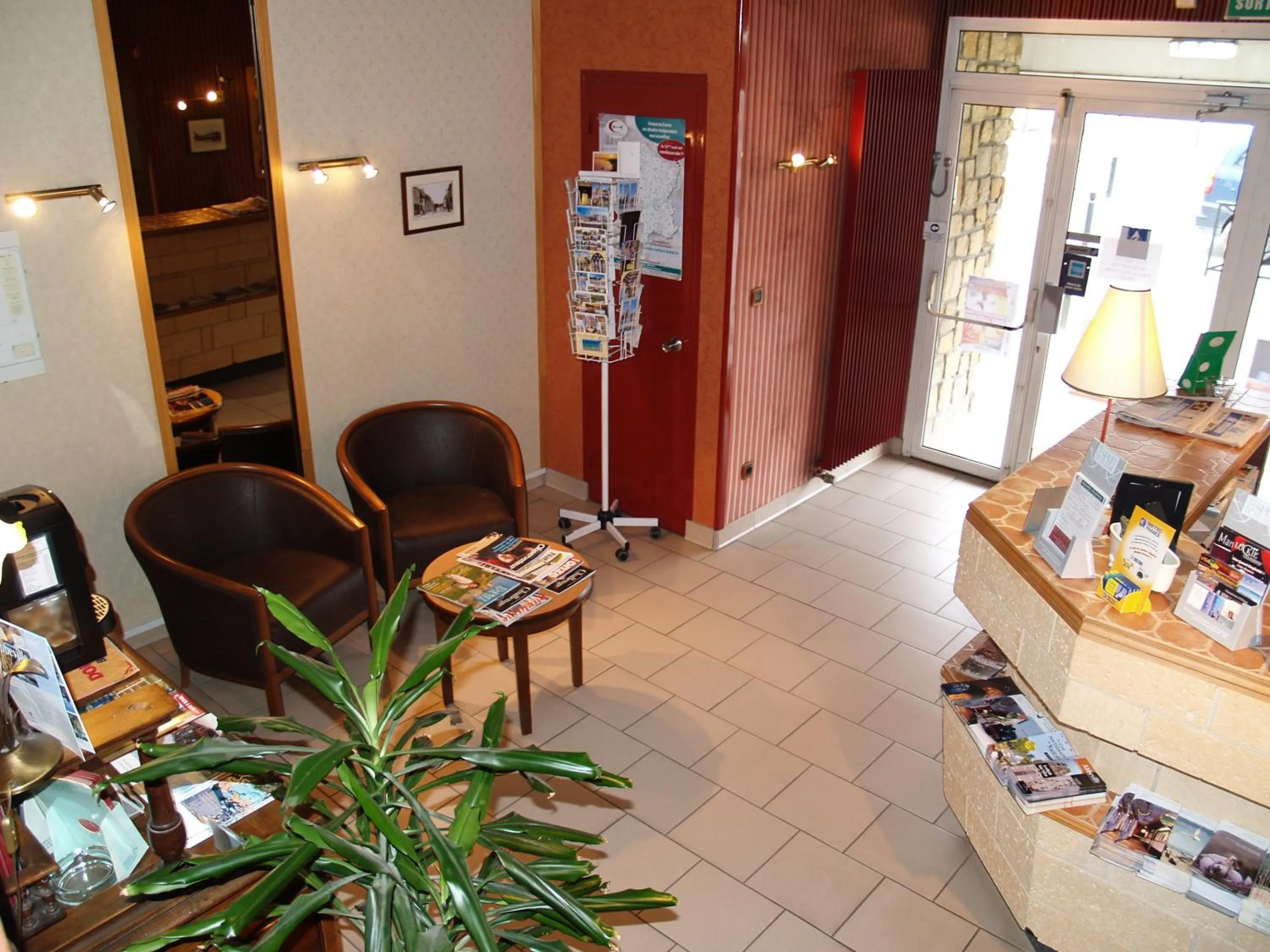 Lobby or reception in Le Relais Vauban