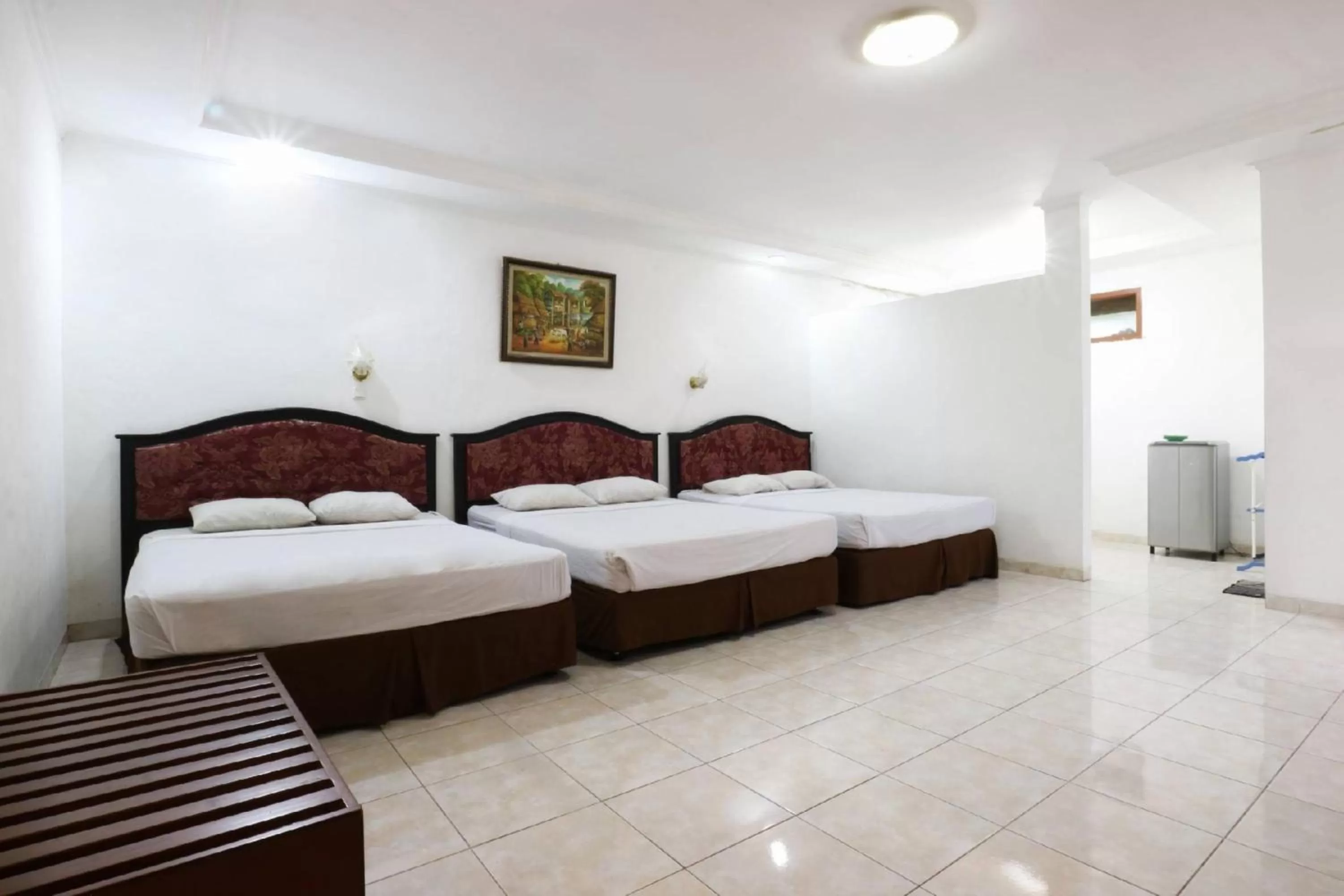 Bed in Narima Resort Hotel