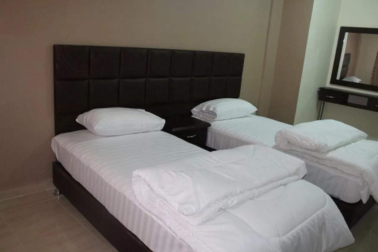 Bed in Al haramain Furnished Apartments