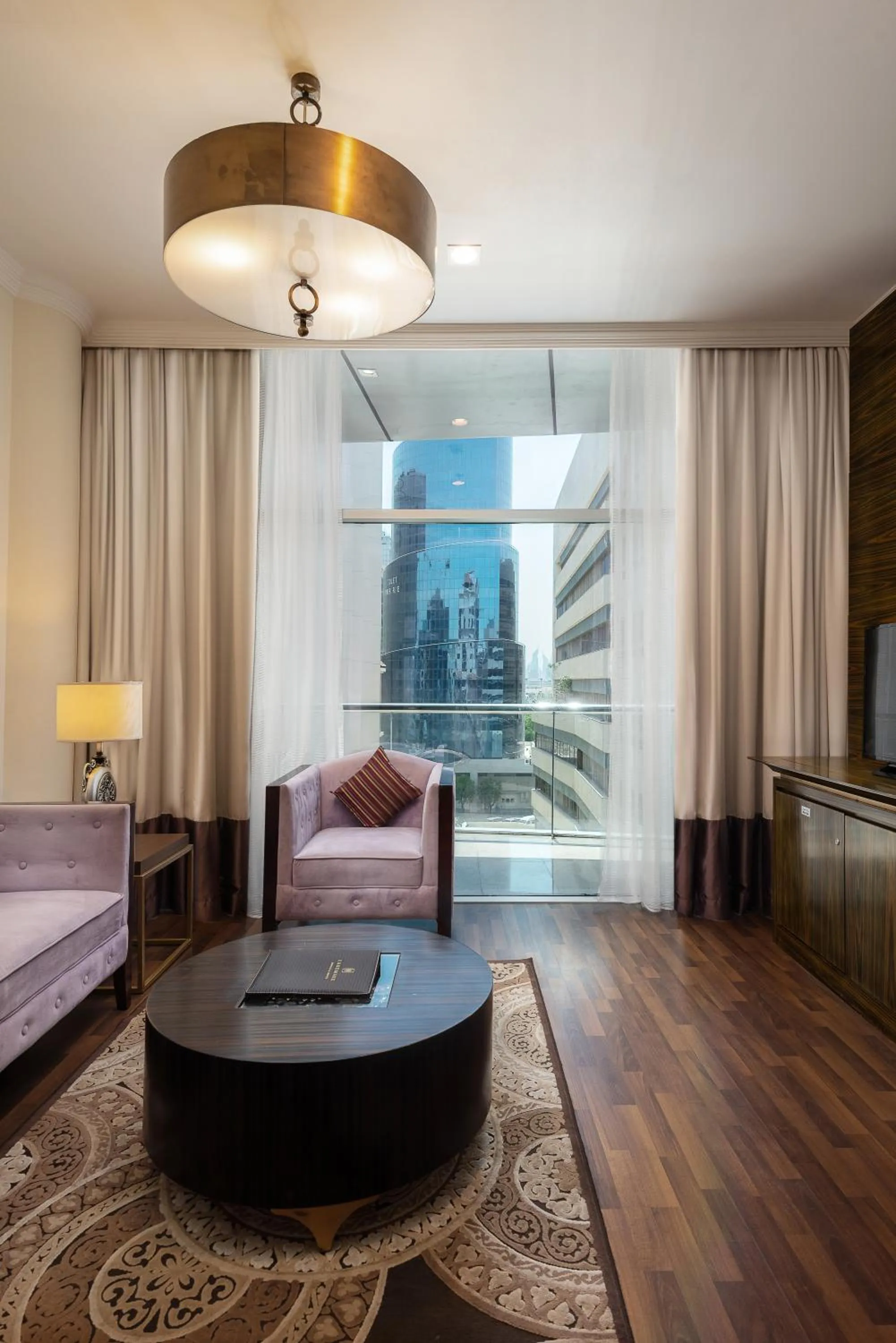 Living room, Bed in Landmark Premier Hotel