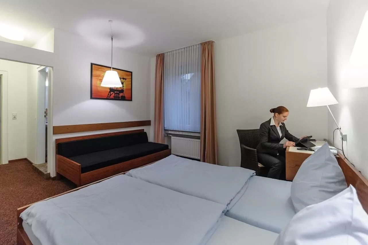 Photo of the whole room, Bed in Hotel Böll Essen