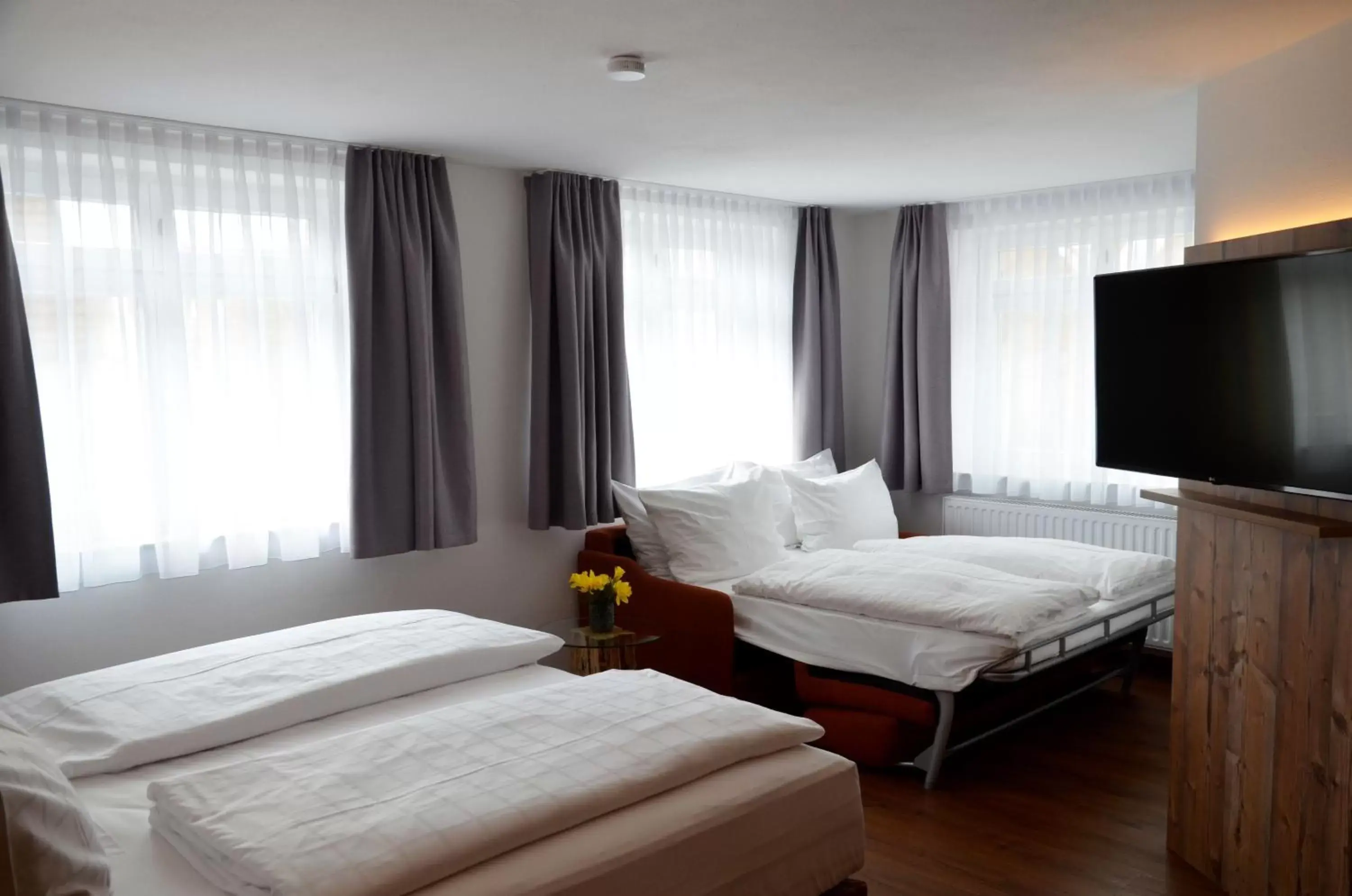 Triple Room in Am Zehntstadl Hotel & Sauna Triple Room in Am Zehntstadl Hotel & Sauna