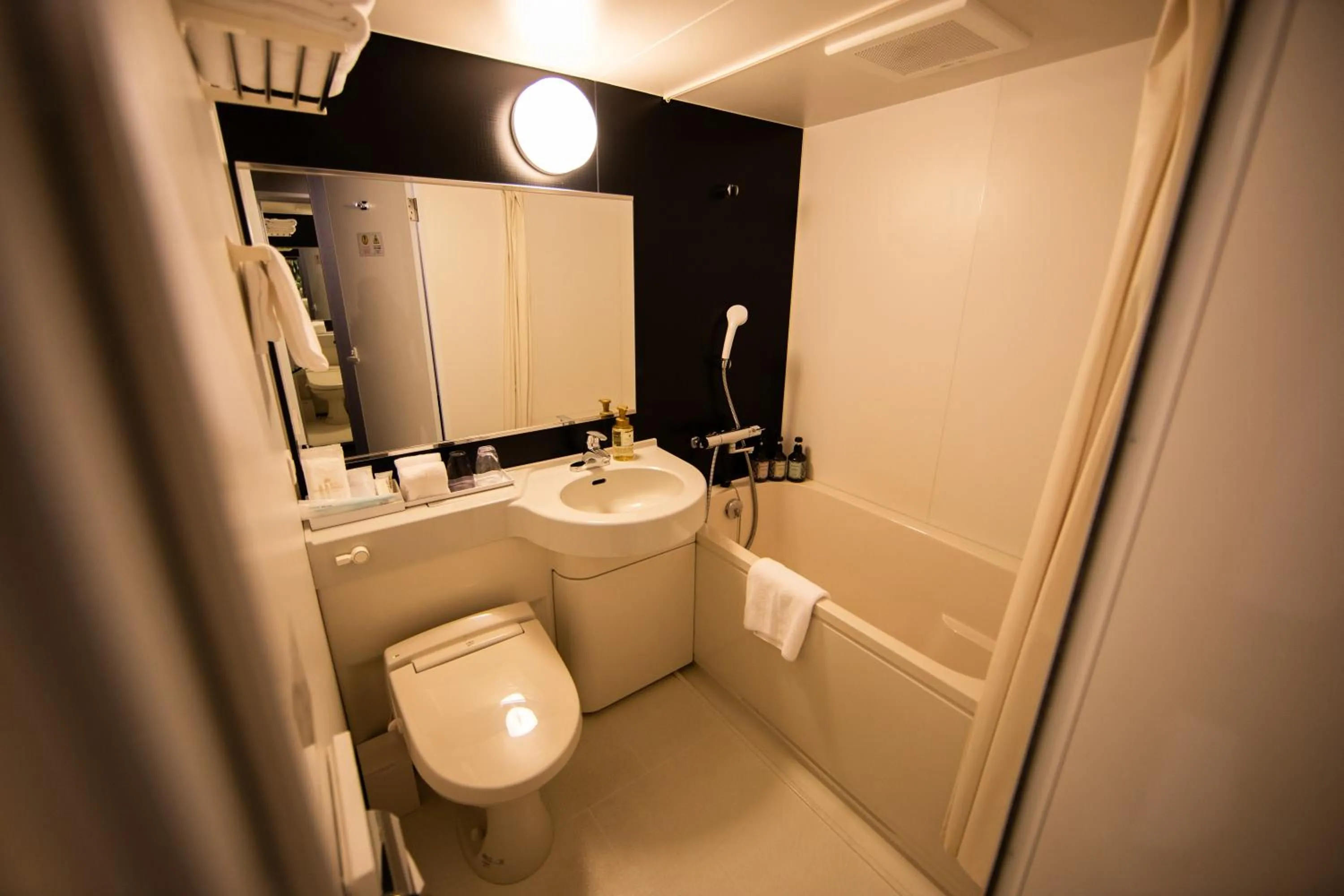 Bathroom in Quintessa Hotel Osaka Shinsaibashi Comic & Books