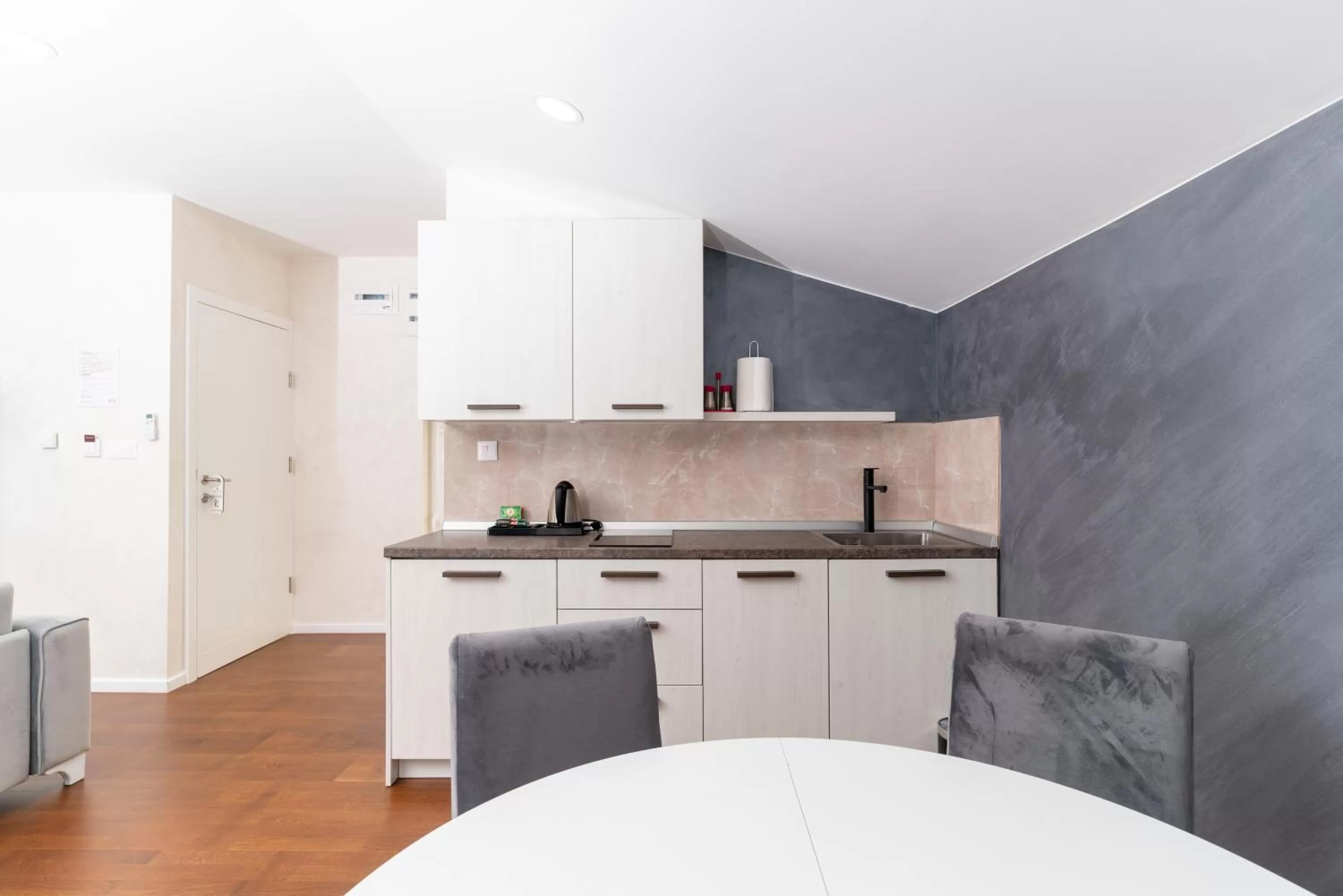 Kitchen or kitchenette in Ornament Hotel and Apartments