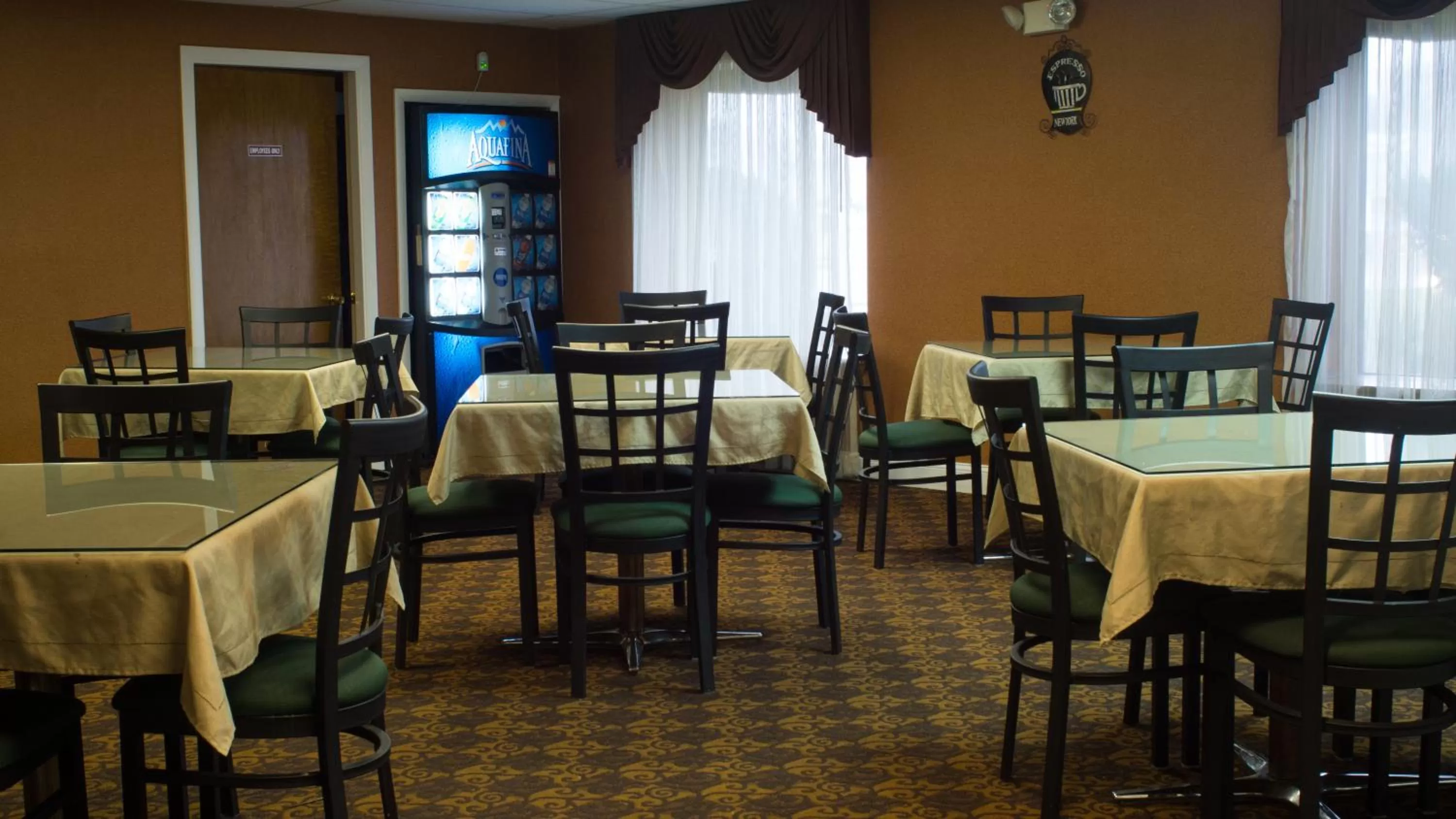 Communal lounge/ TV room in Ambassador Inn and Suites