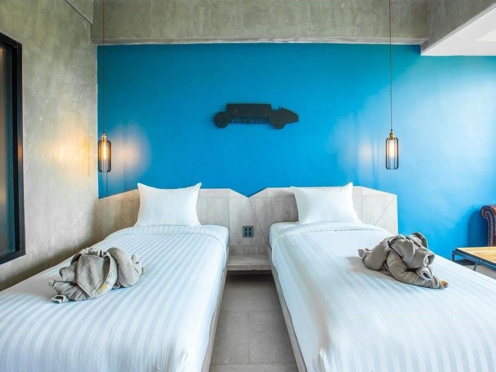 Bed in Loft Mania Boutique Hotel