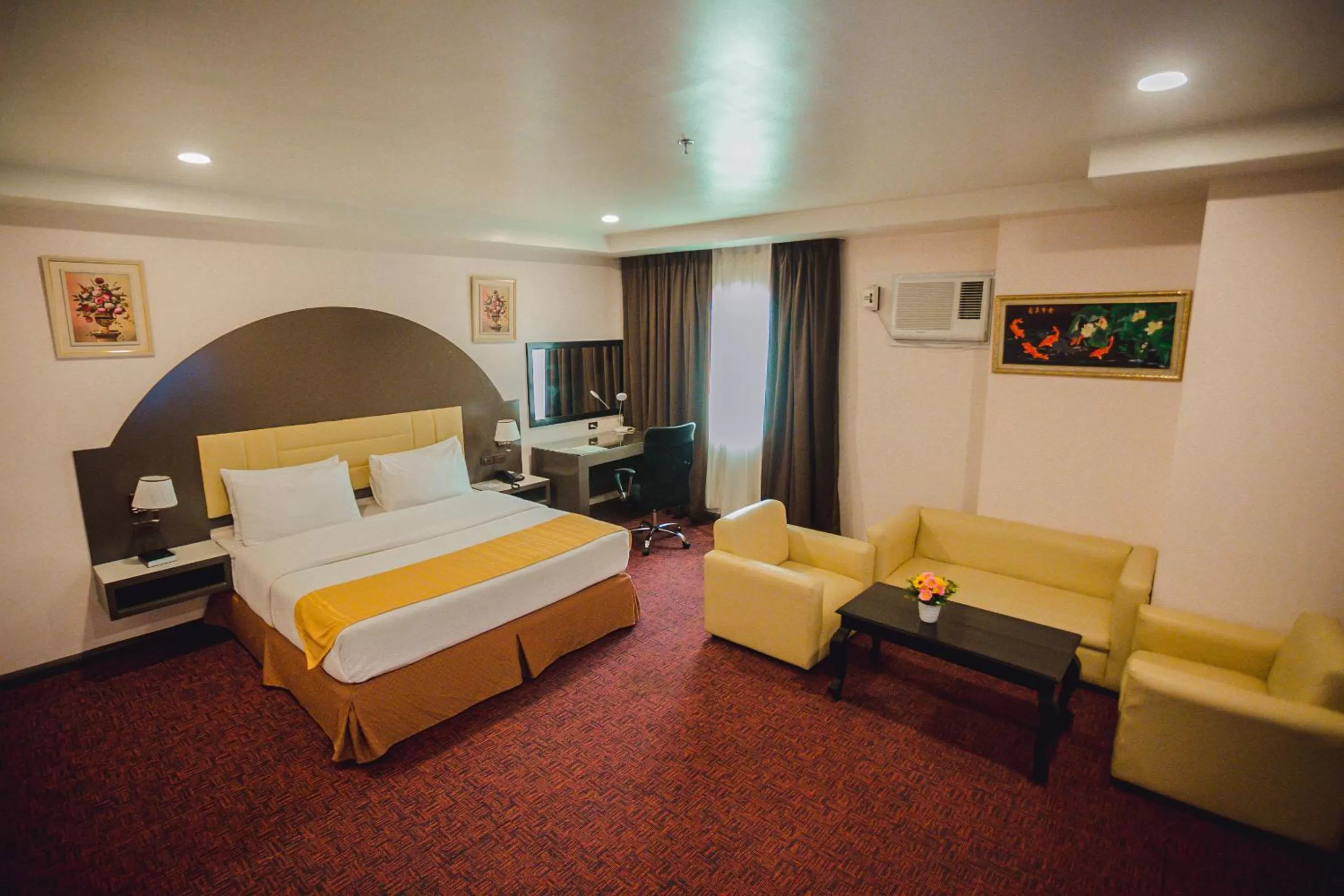 Living room, Bed in Butuan Grand Palace Hotel