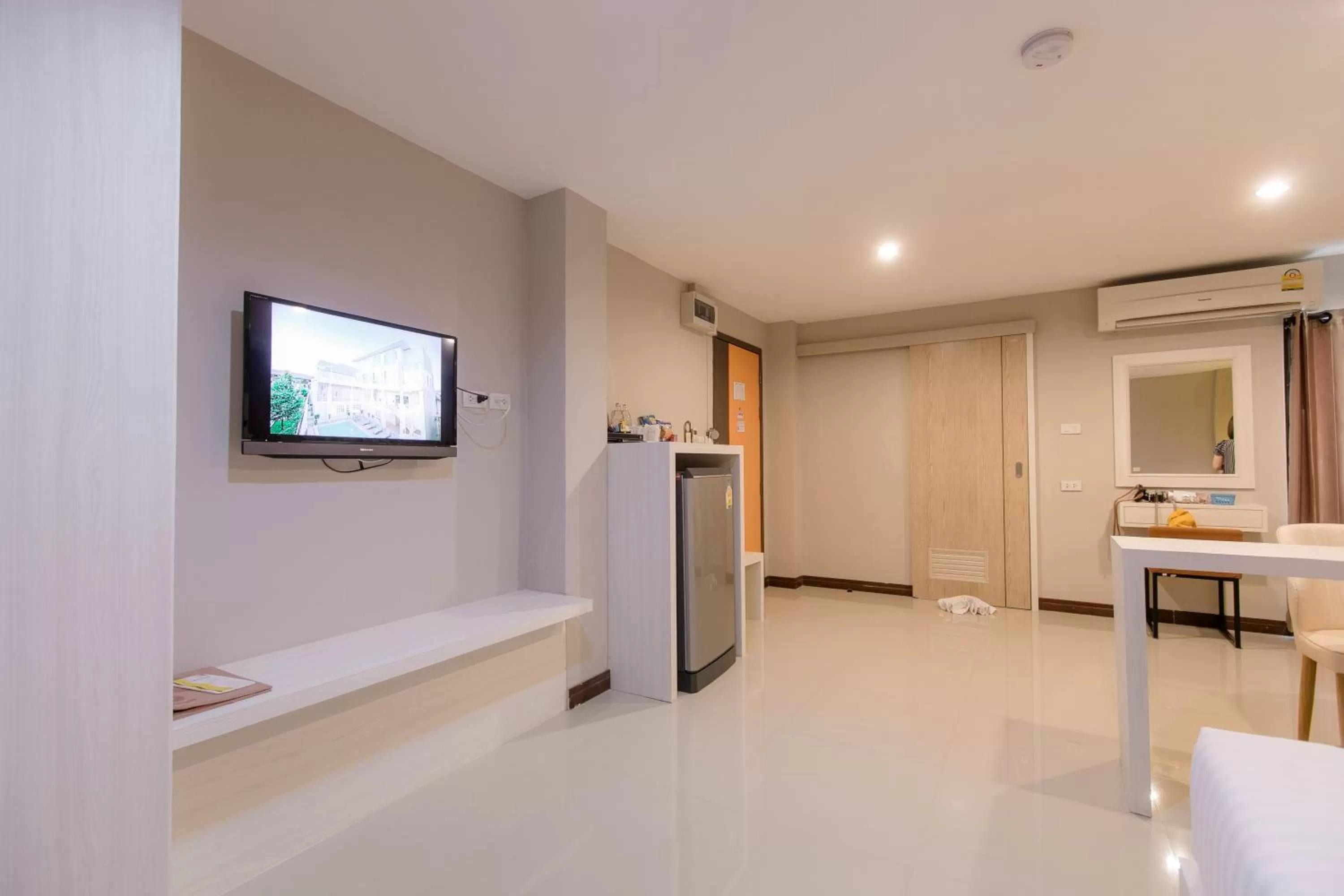 Bed in De Hug Hotel & Residence