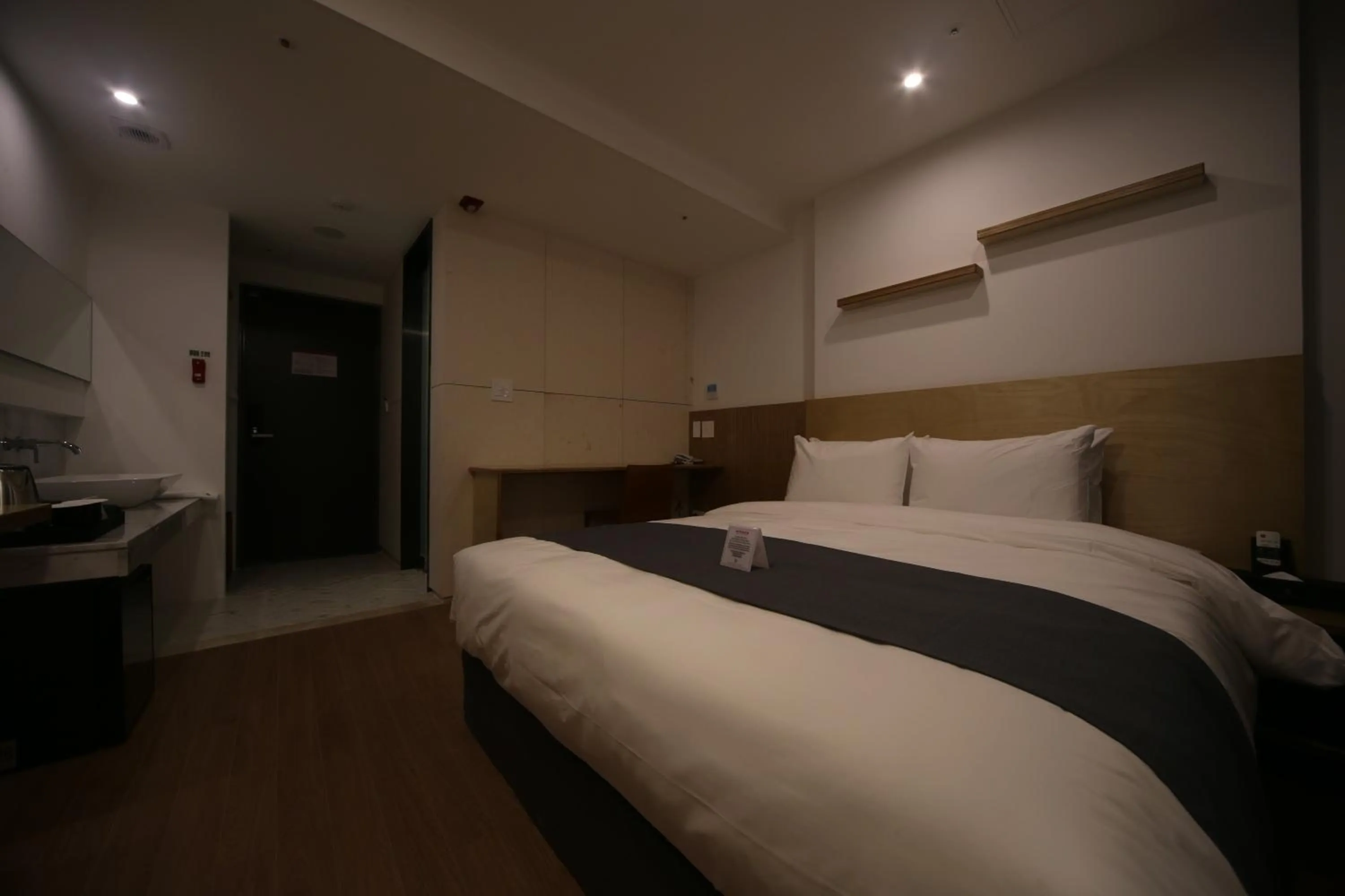 Bed in Hotel Noblestay