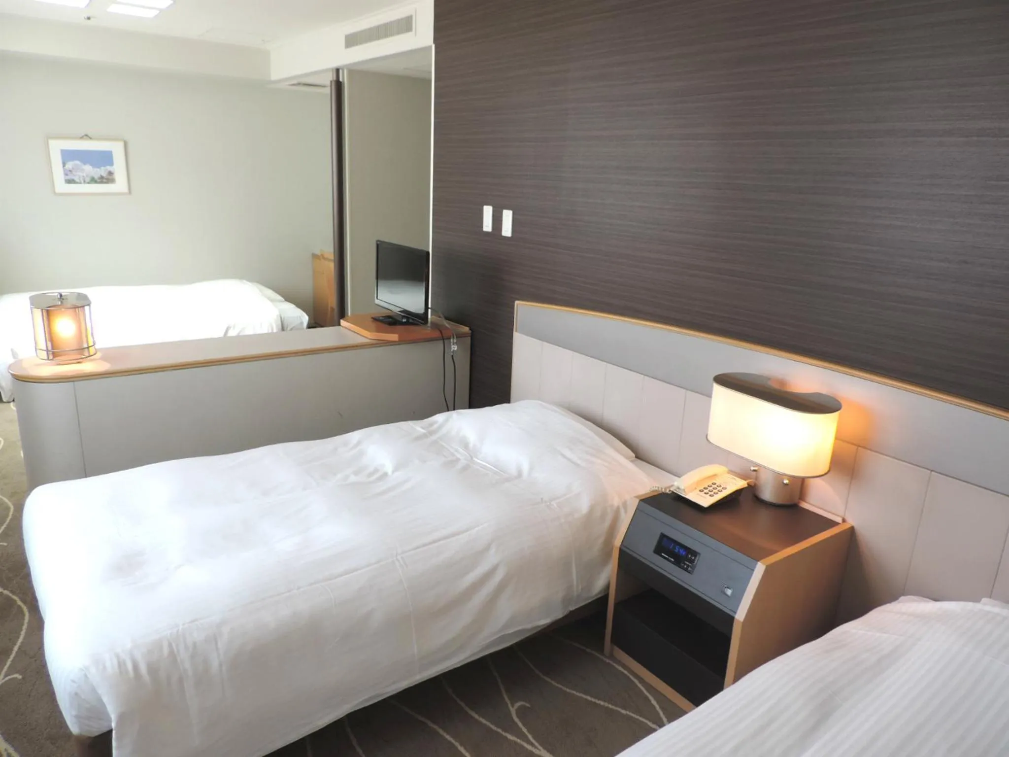 Photo of the whole room, Bed in Hotel Awina Osaka
