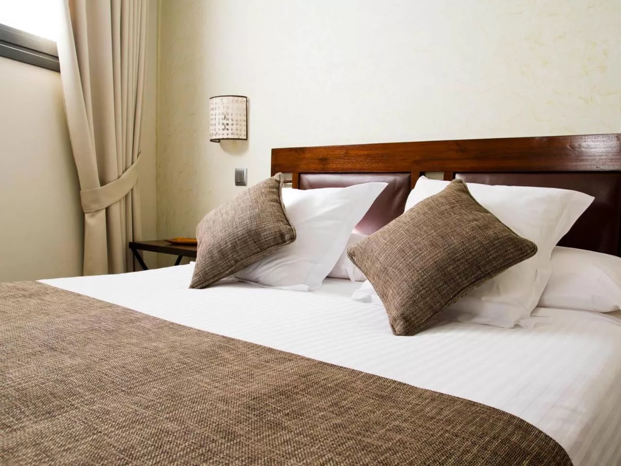 Bed in Le Petit Boutique Hotel