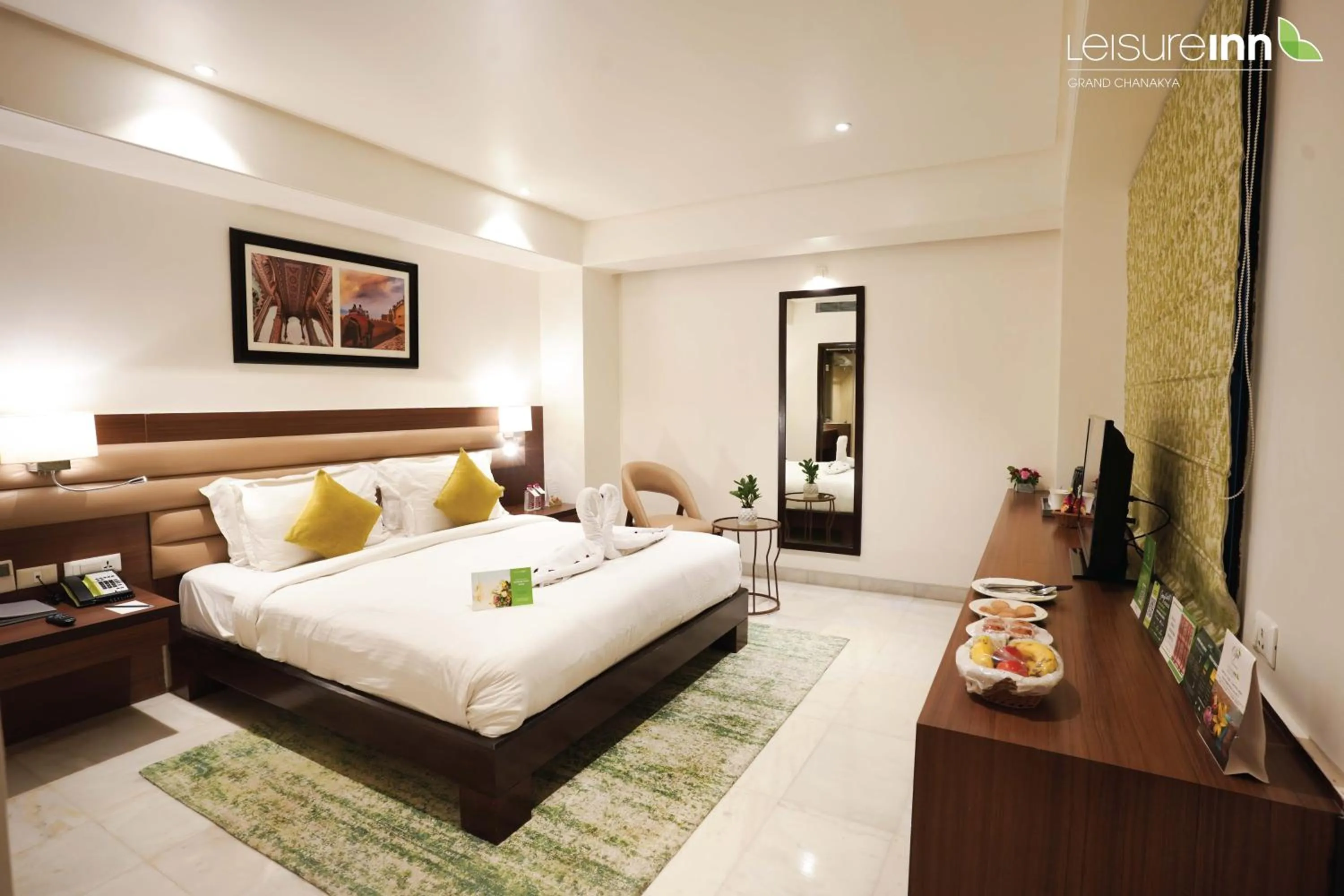 Bed in Leisure Inn Grand Chanakya