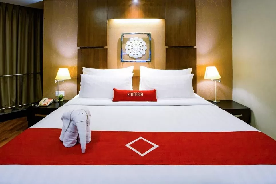 Bed in Emersia Hotel and Resort