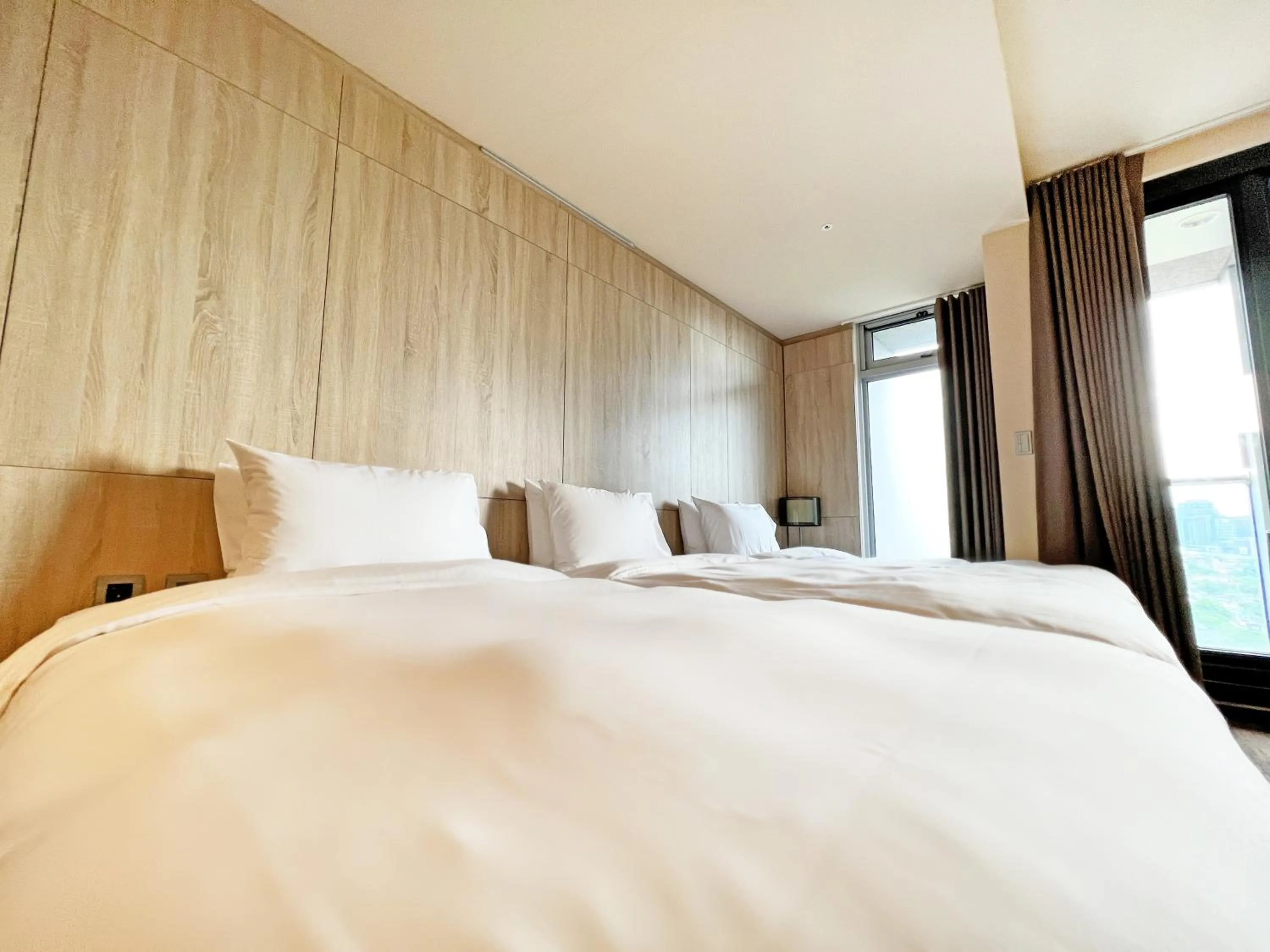 Bedroom in Wallsun Hotel