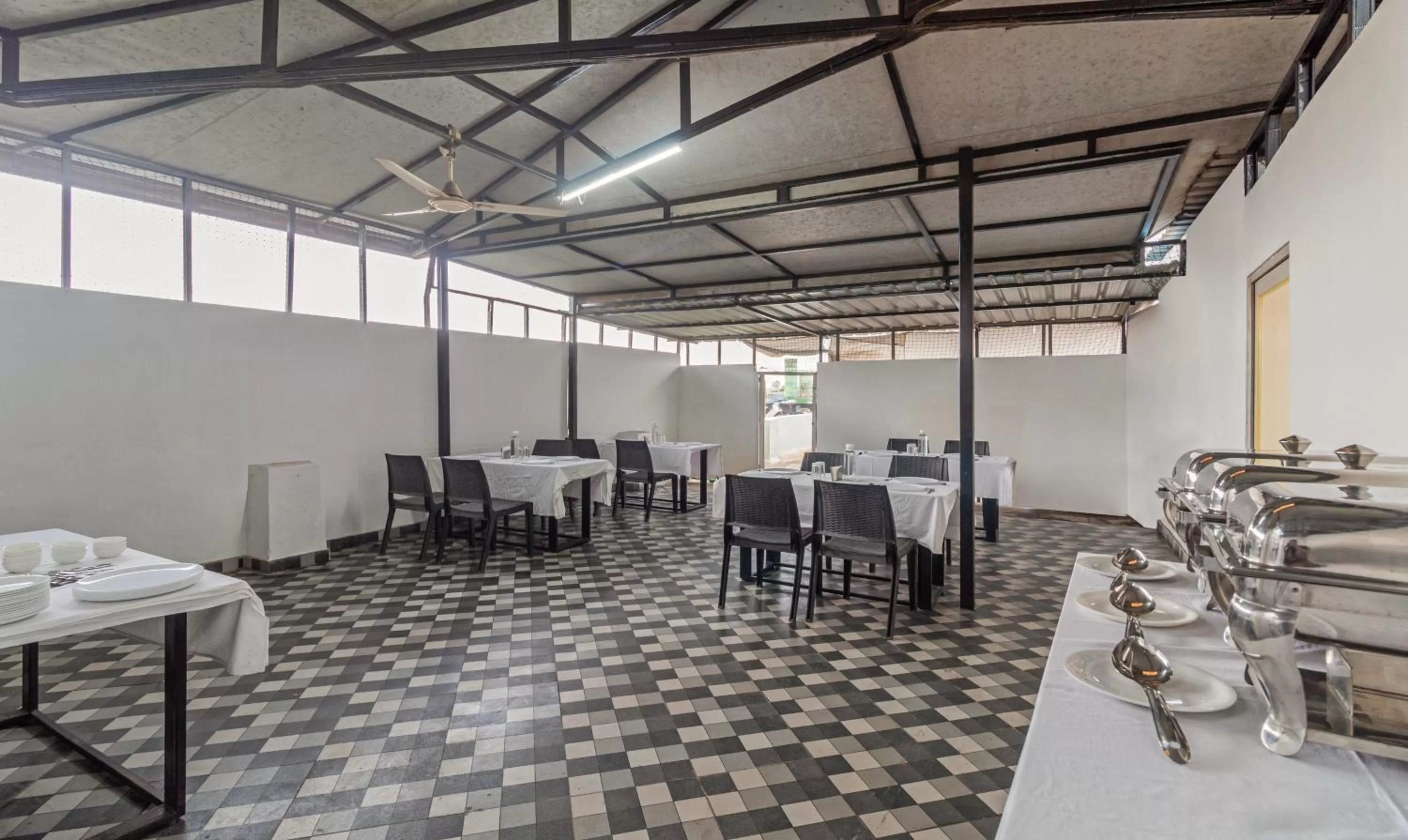 Dining area in Treebo Tulip Comfort