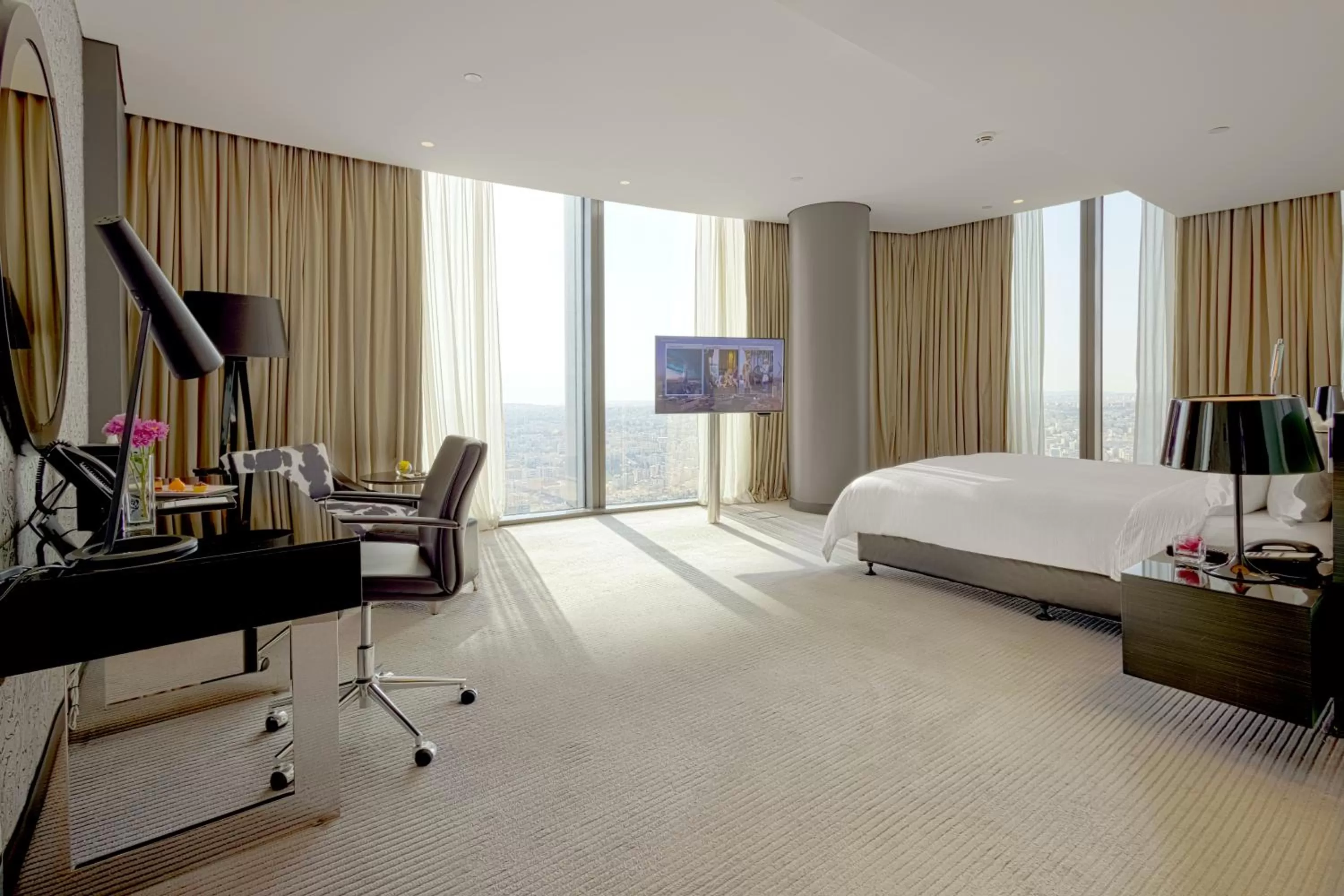 Living room, Bed in Amman Rotana