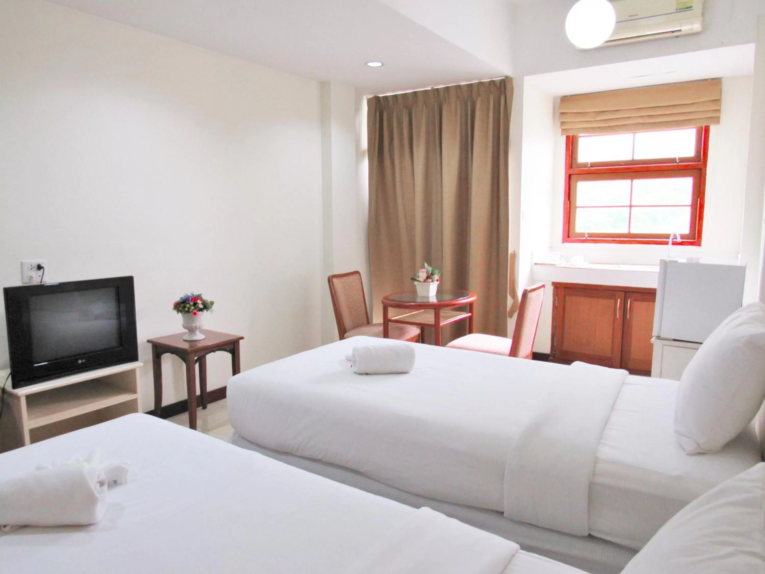 Bed in JL Bangkok Hotel