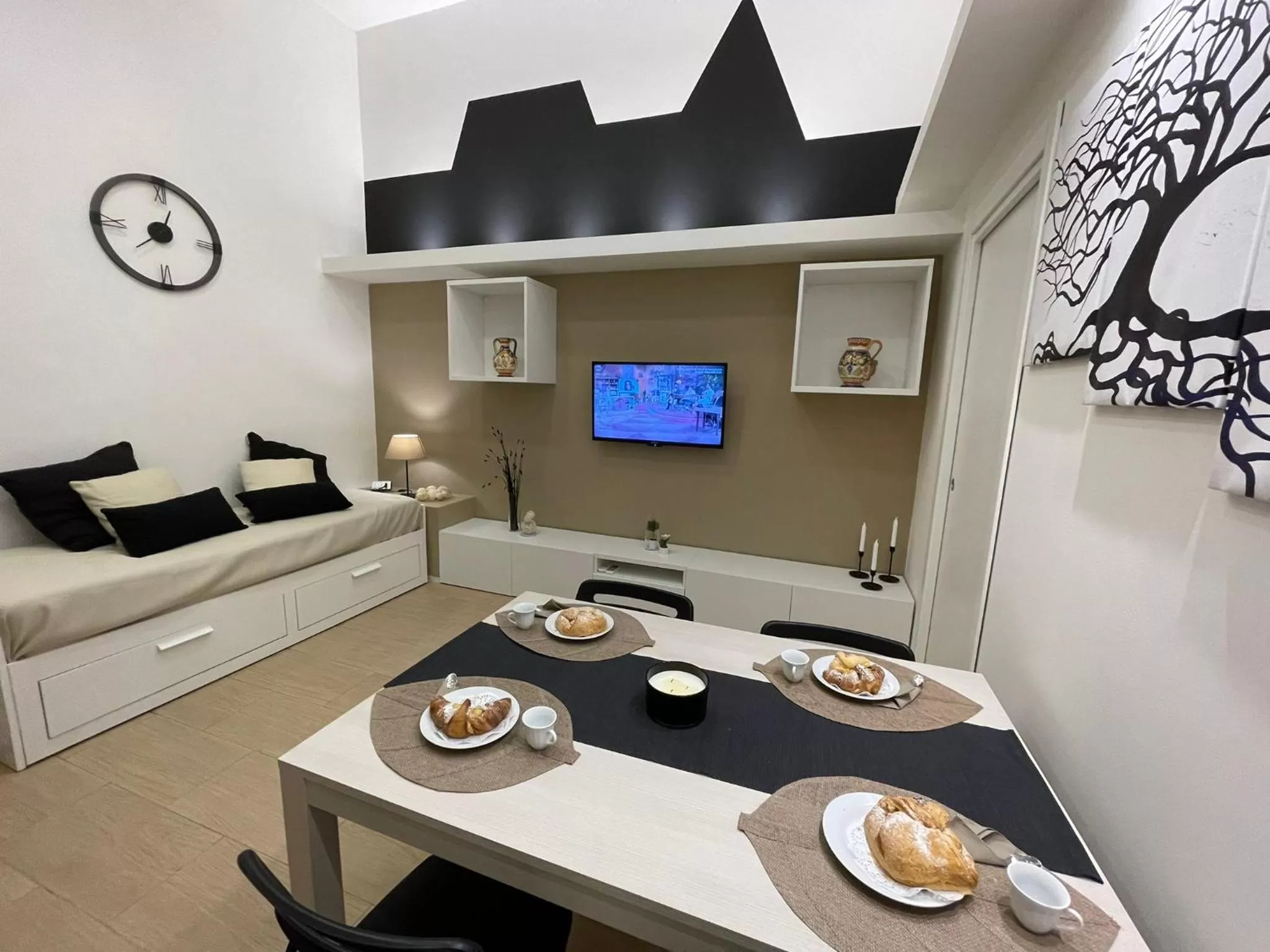 Dining area, Bed in Suite Ciclopi Acitrezza