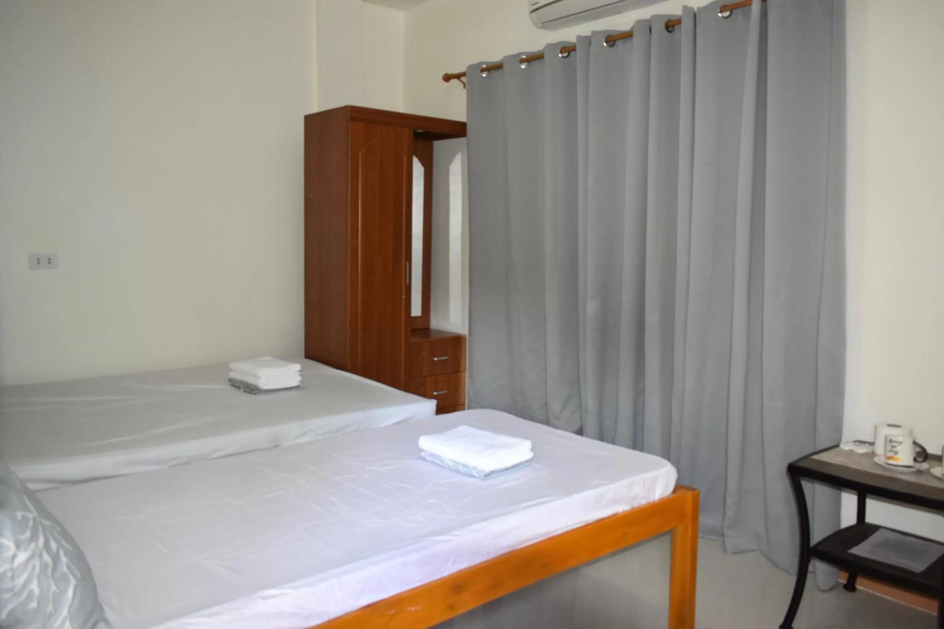 Bed in Charlina Inn Panglao