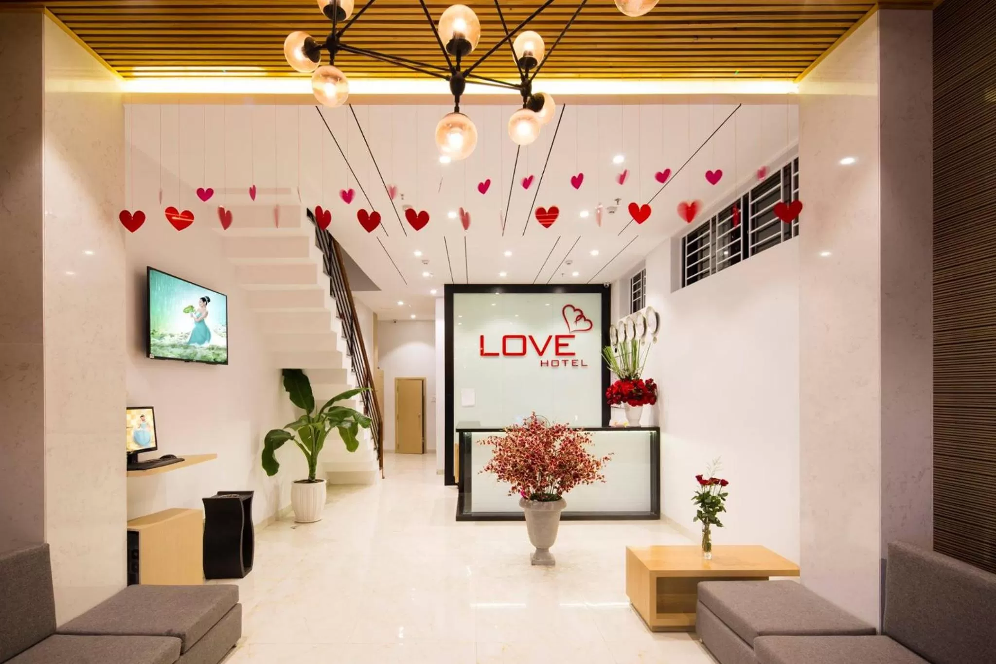 Communal lounge/ TV room in Love Hotel
