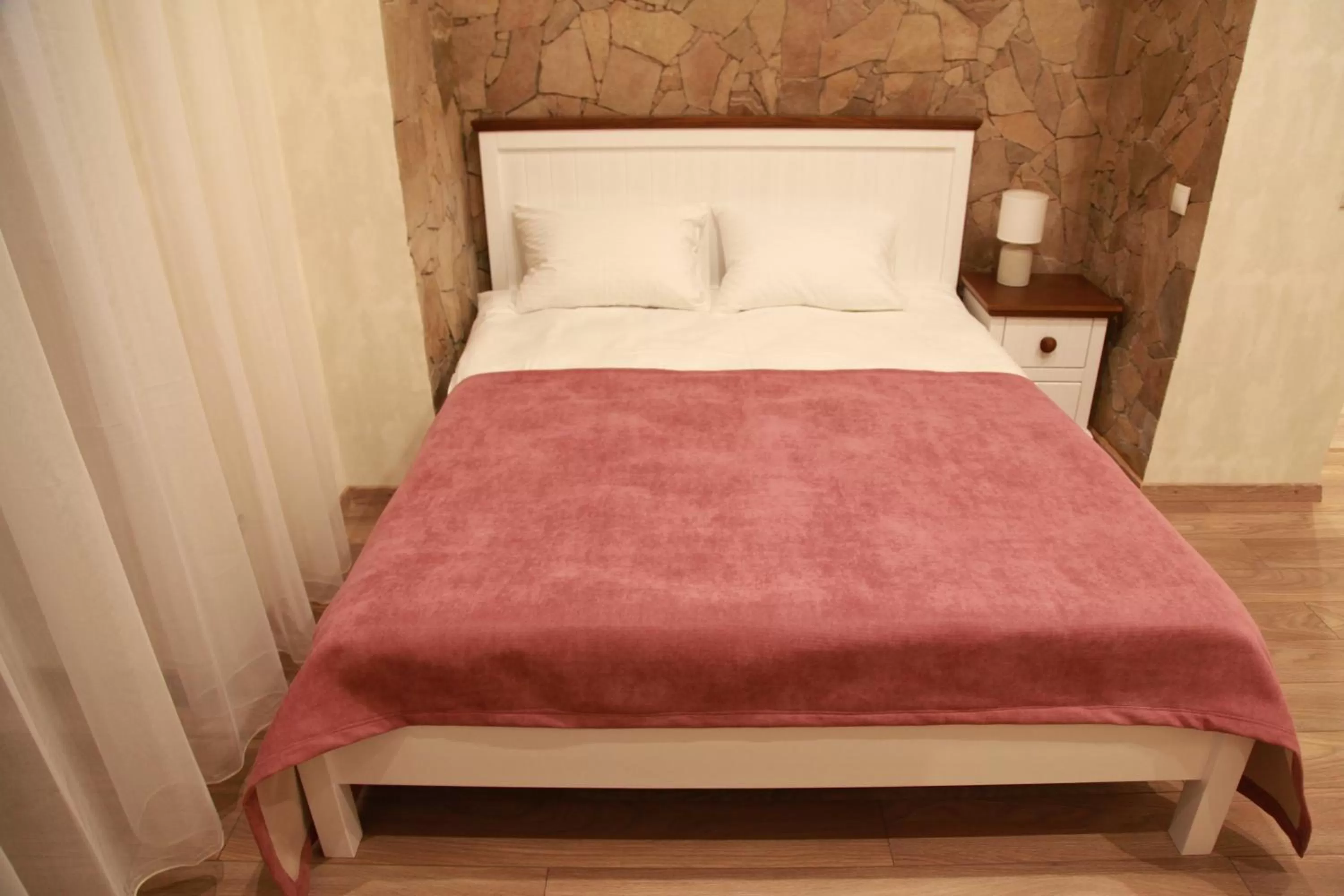 Bed in WINE & ROSE BOUTIQUE HOTEL