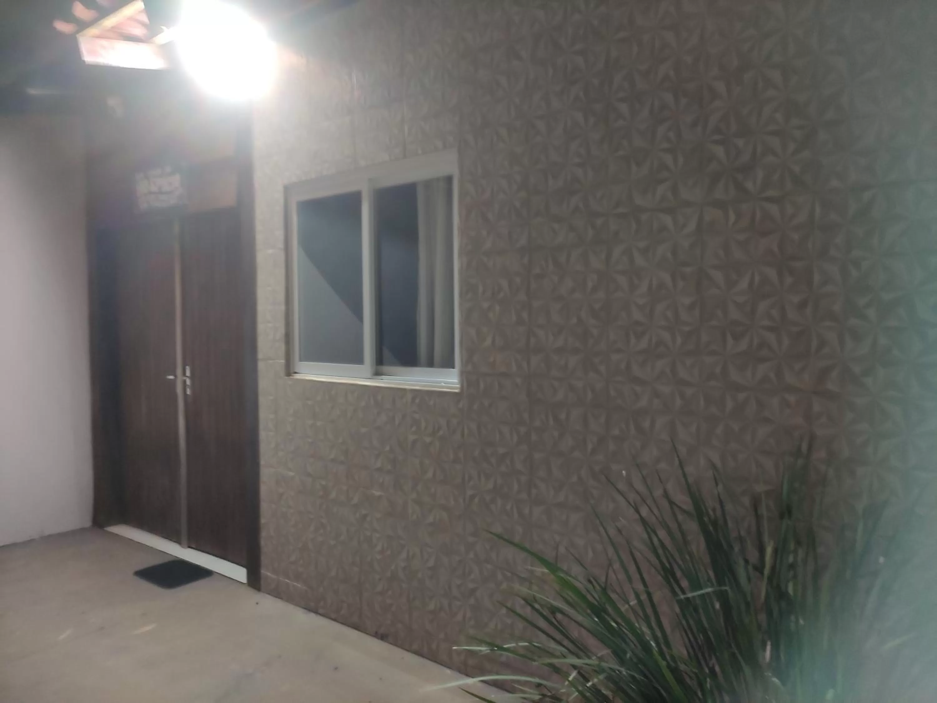 TV/Entertainment Center in Pousada da Gi Suítes e Turismo