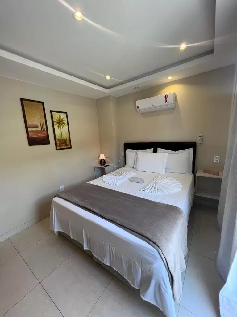 Bed in Pousada Arraial Tropical