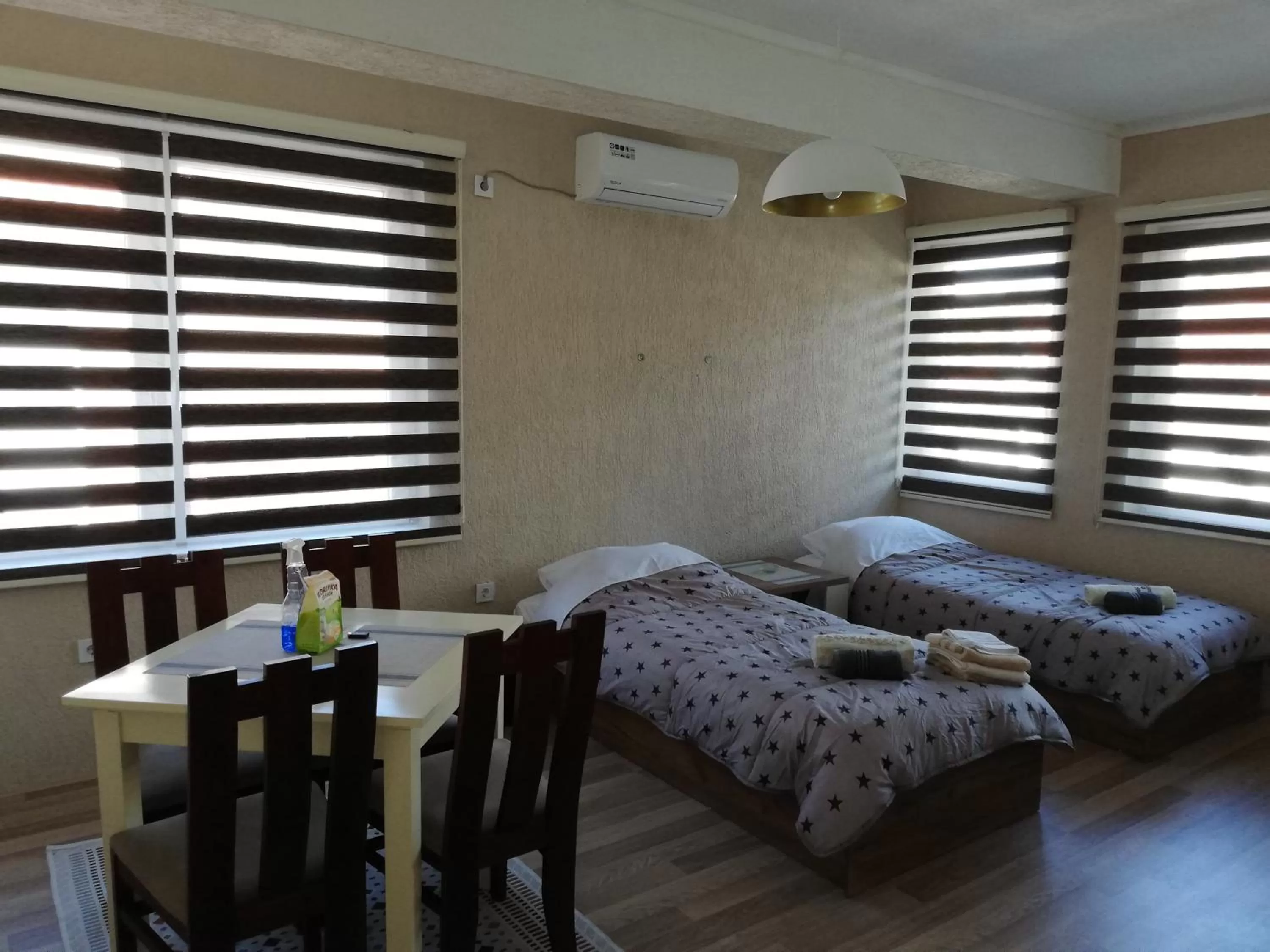 Bed in DIONIS Rooms & Apartments