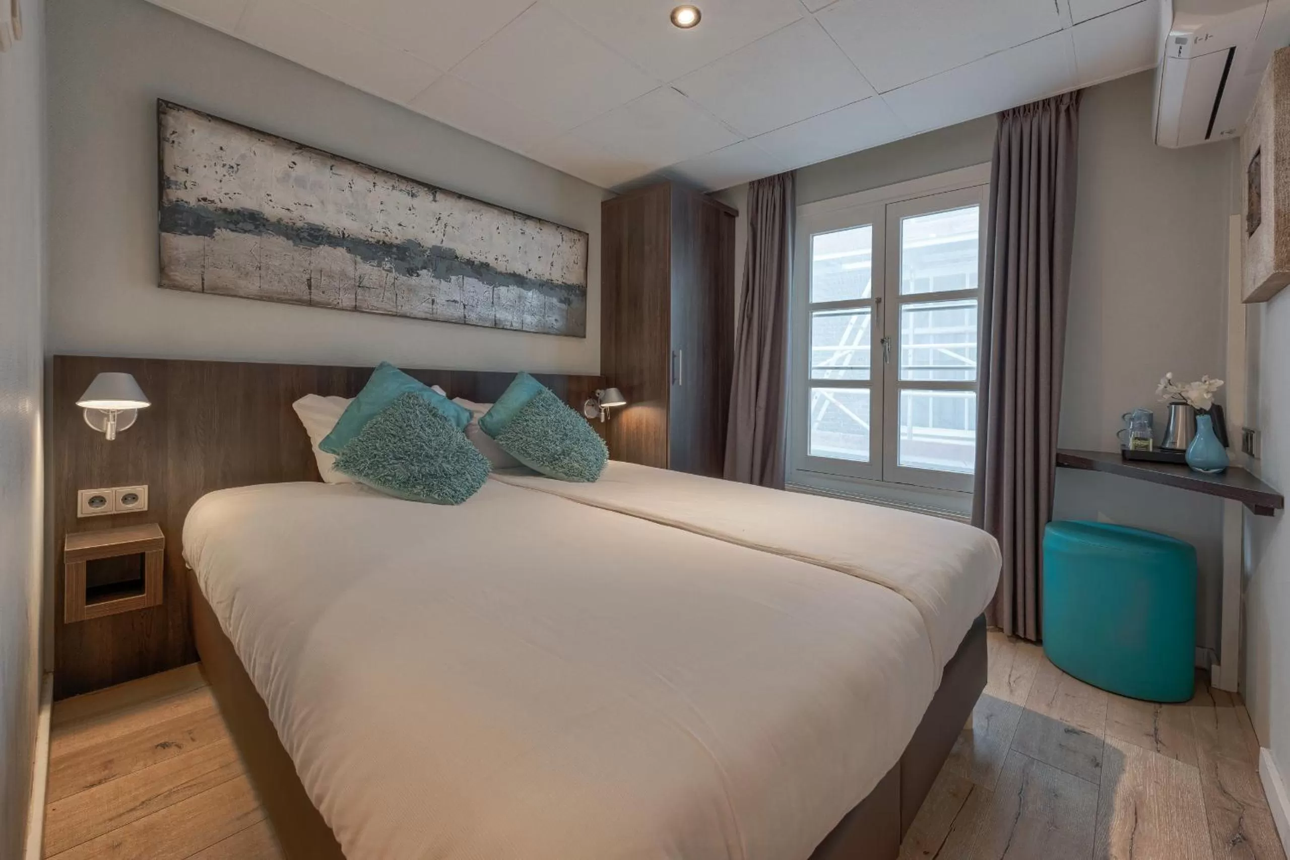 Bed in Hotel Damsquare