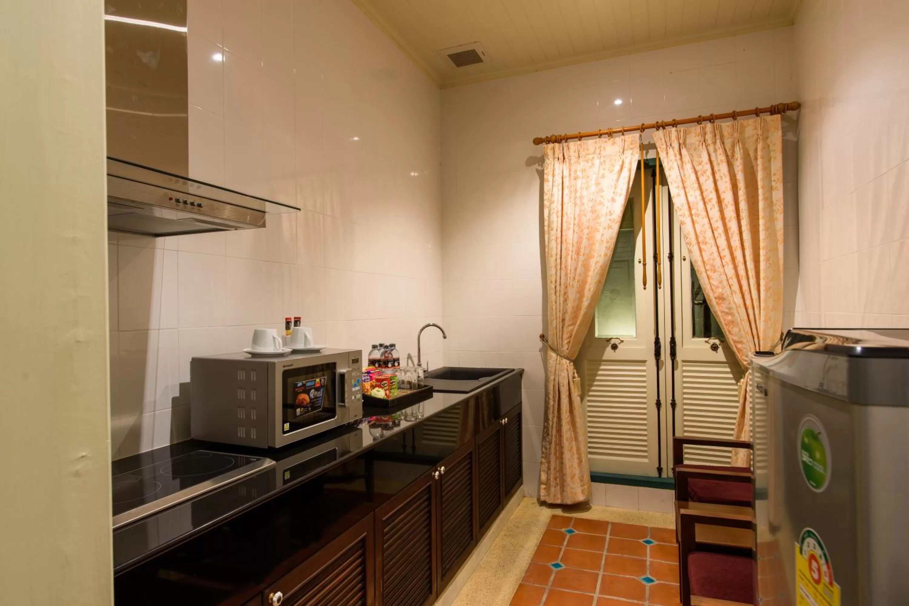 Kitchen or kitchenette in Kalanan Riverside Resort