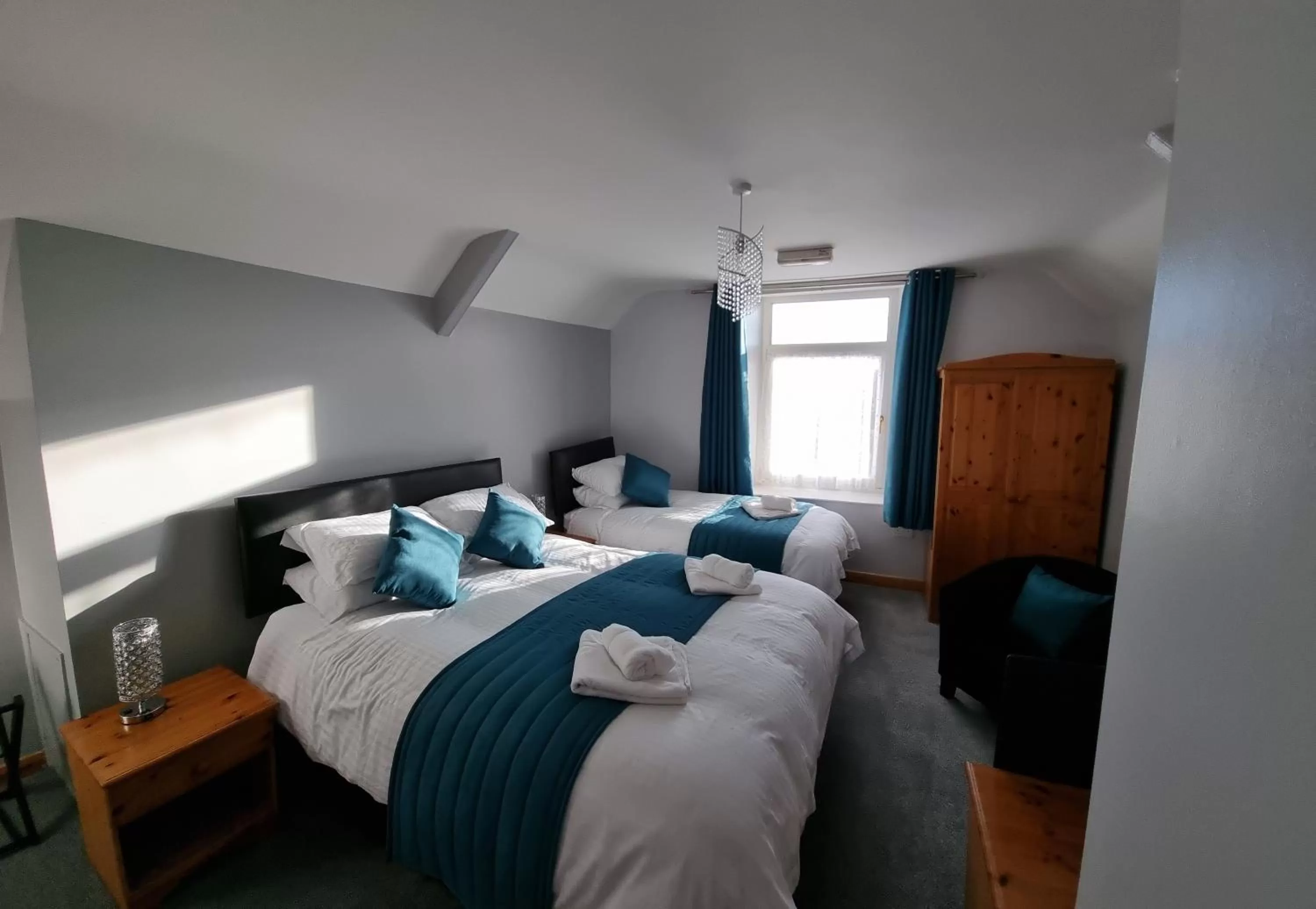 Photo of the whole room, Bed in City Inn